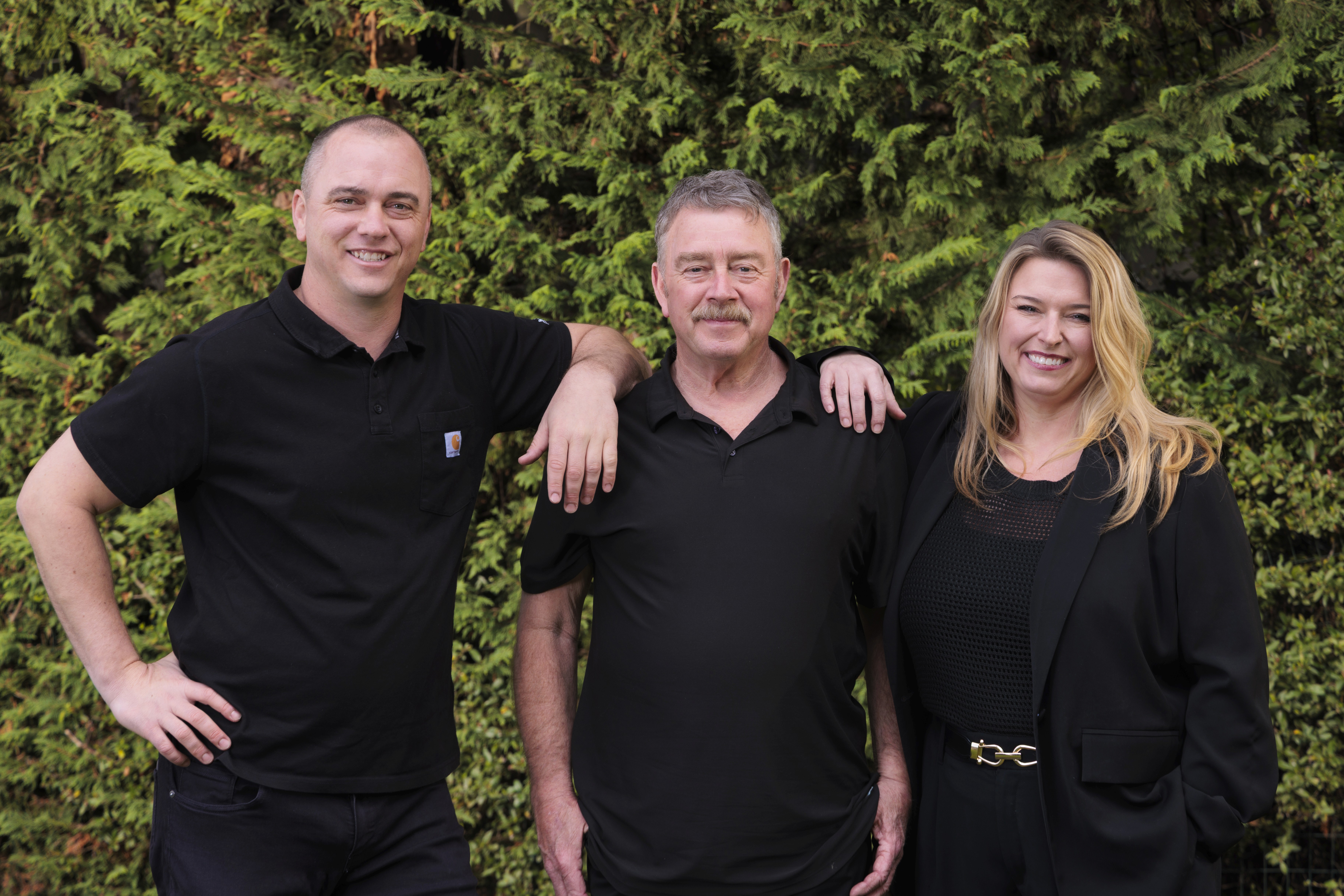 The Weaver Construction Leadership Team Standing Together