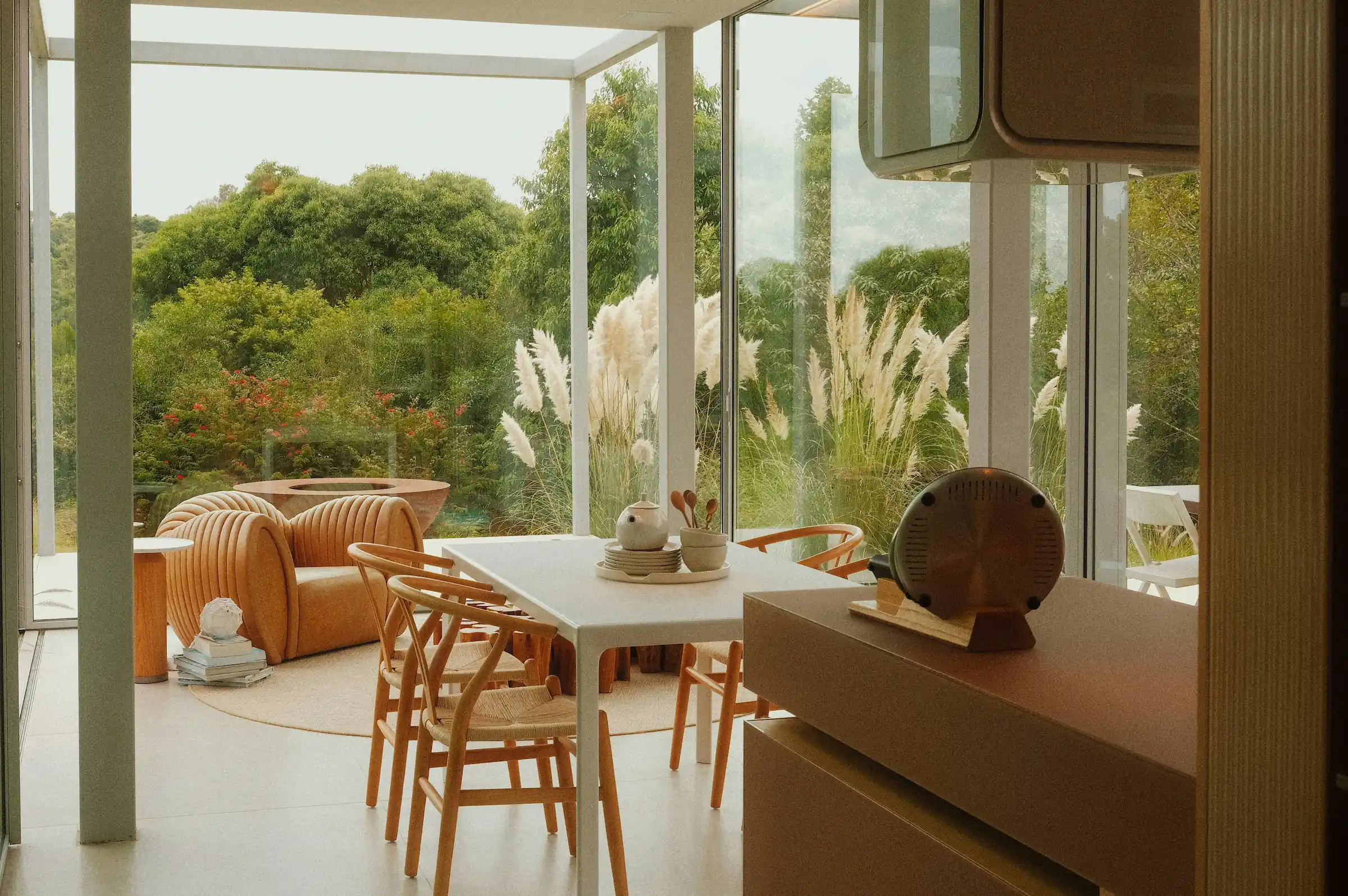 Contemporary wooden architecture featuring natural cedar cladding and floor-to-ceiling glazing