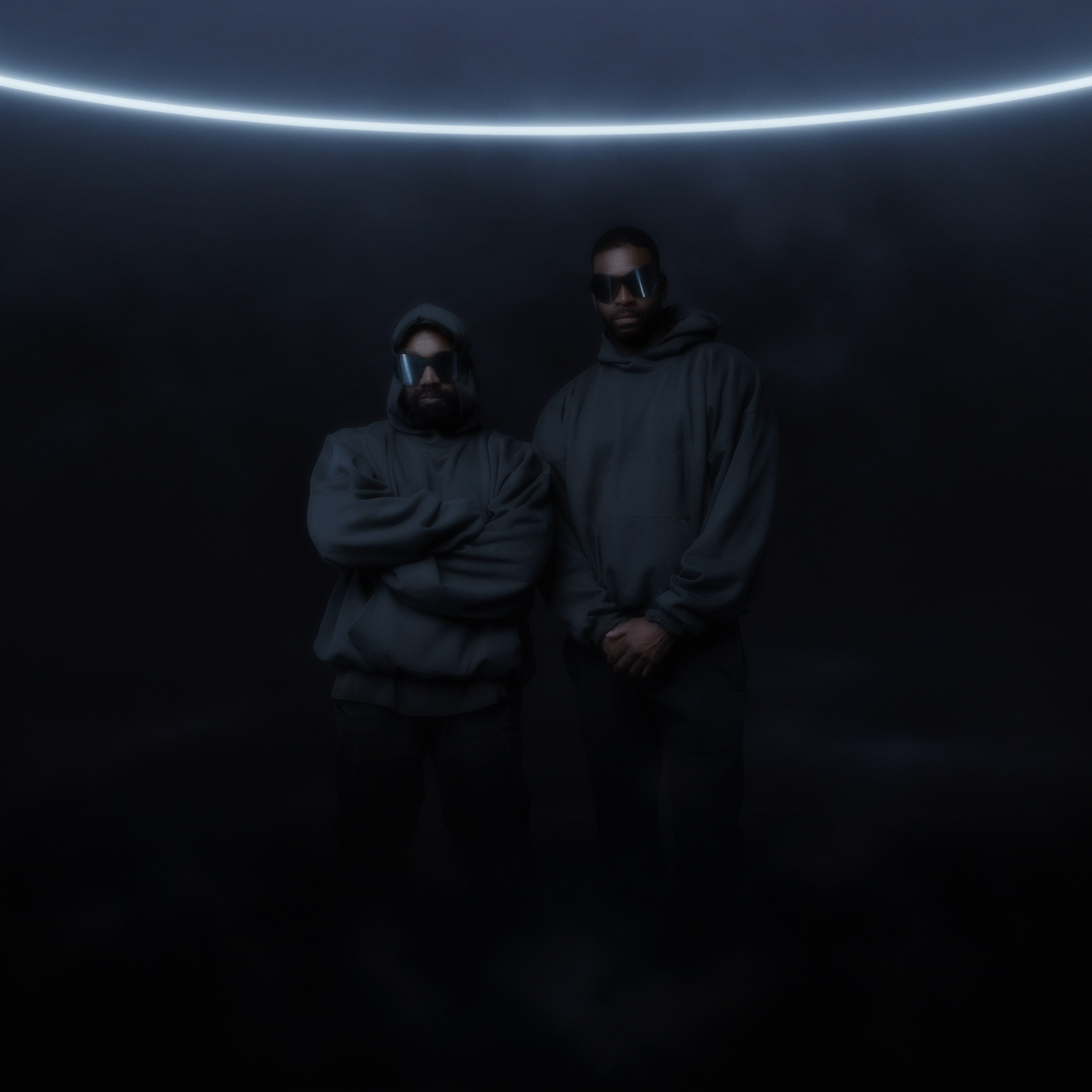 Snow-capped mountains viewed through a car window.