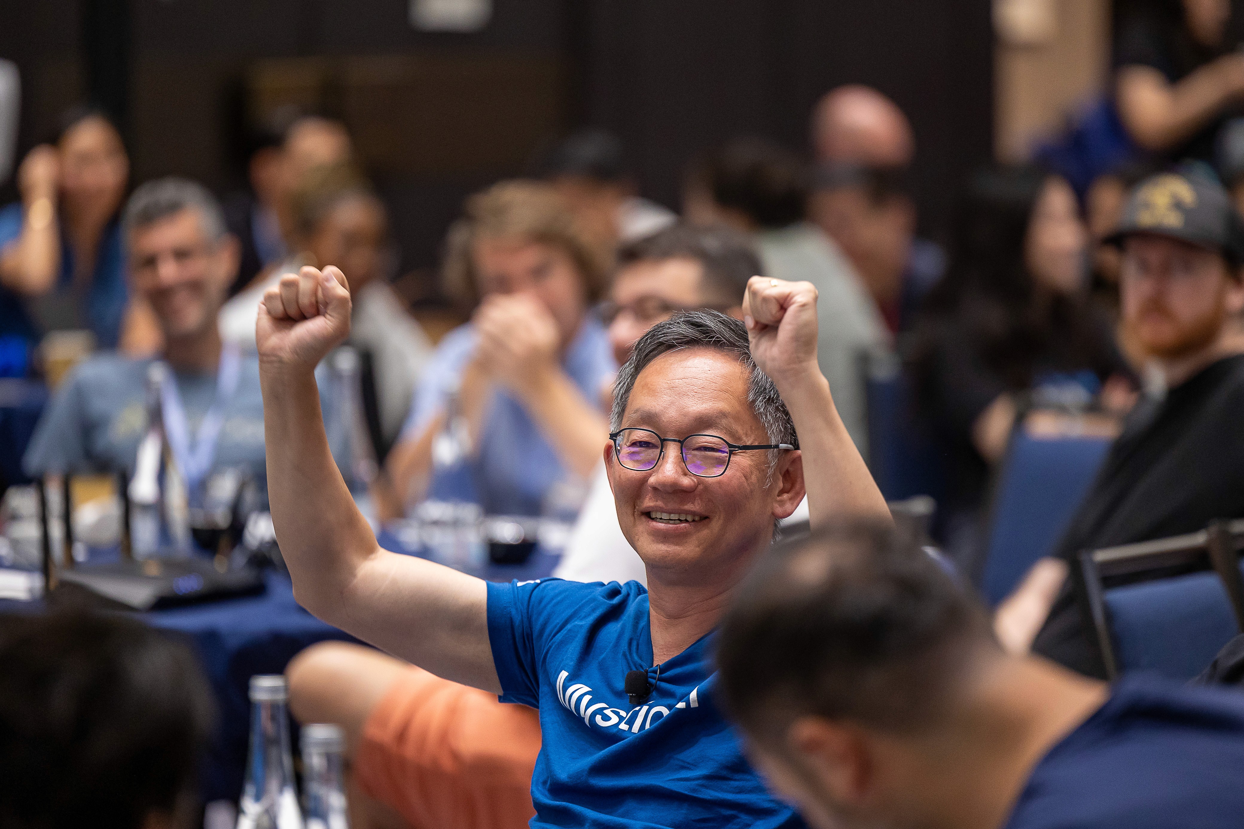 Photo of Evan Cheg cheering