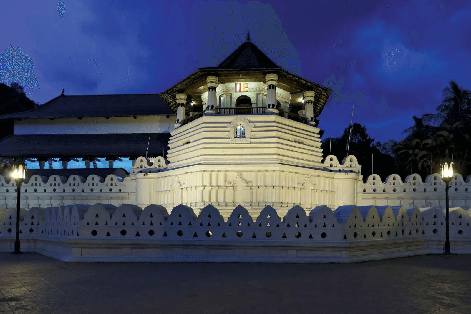 This image shows the Temple of the Sacred Tooth Relic in Kandy, Sri Lanka