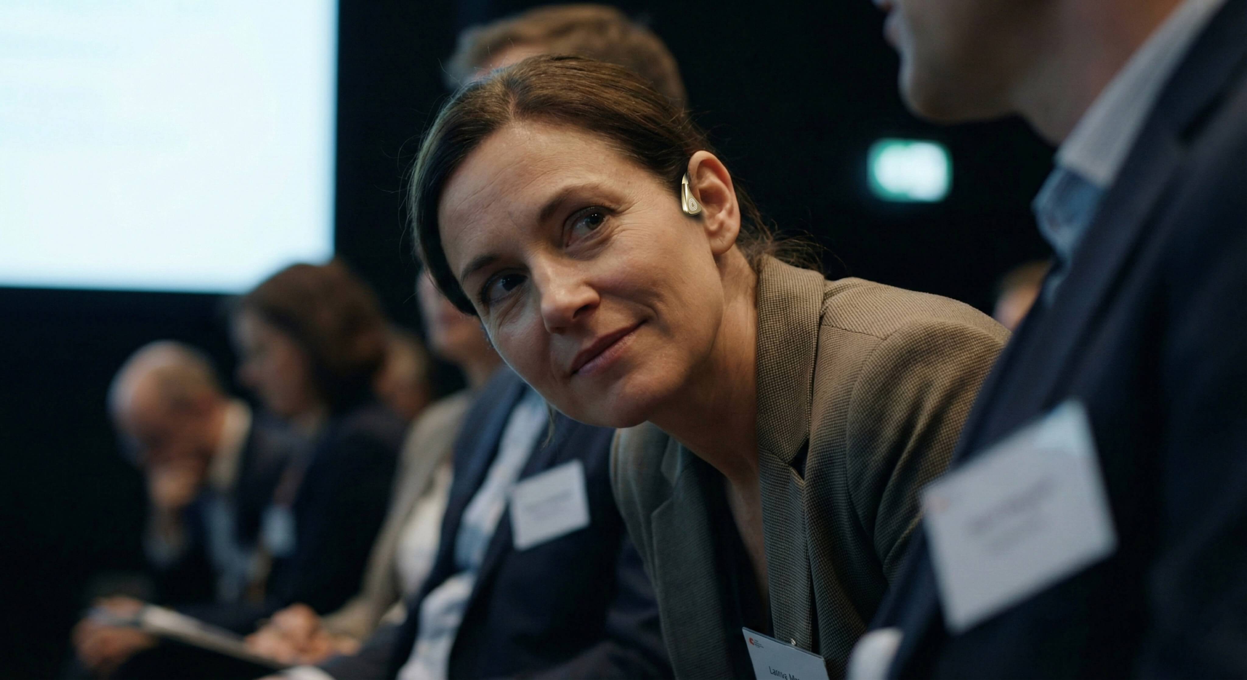 Modern white building with a covered walkway and bicycle.