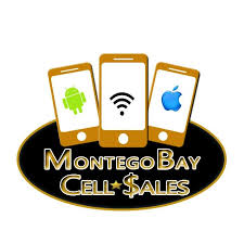 Smiling man with glasses and a short beard wearing a white t-shirt stands against a deep purple background, conveying a cheerful and friendly tone.