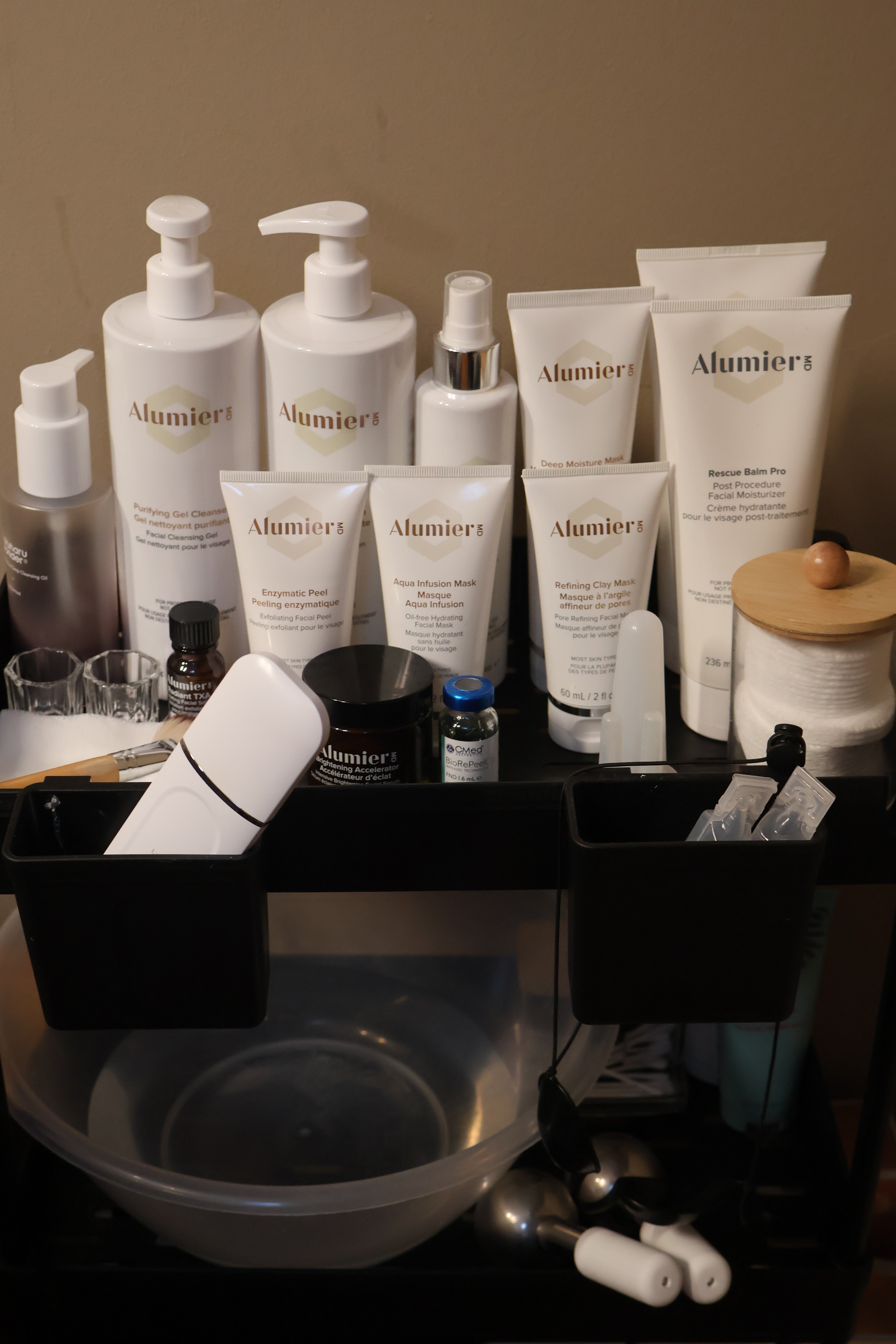 Rachel, personal trainer, looking to the side confidently in a fitness studio