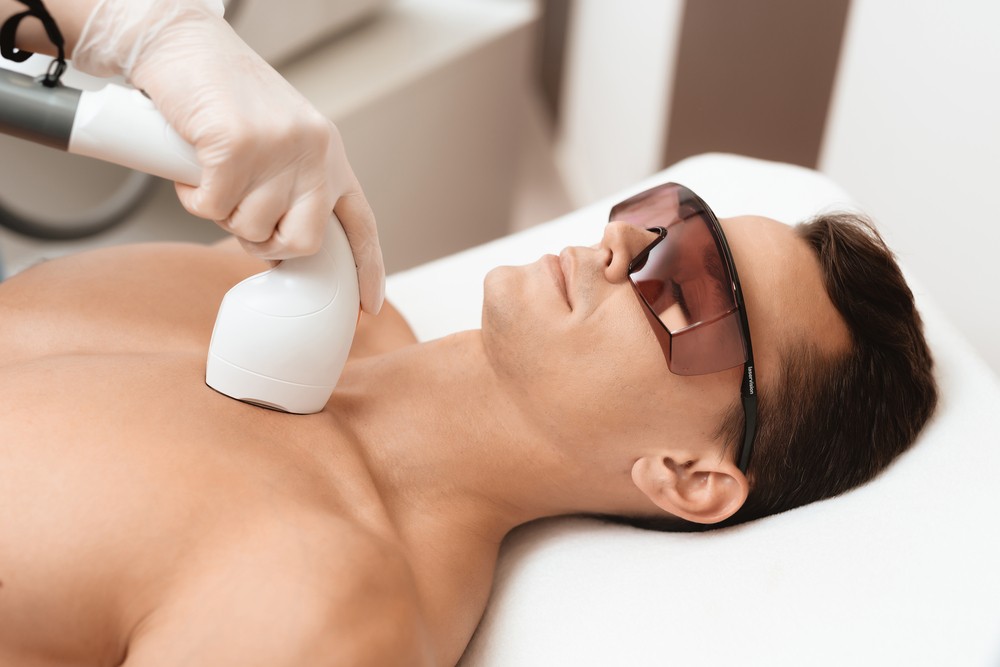 man getting laser hair removal procedure