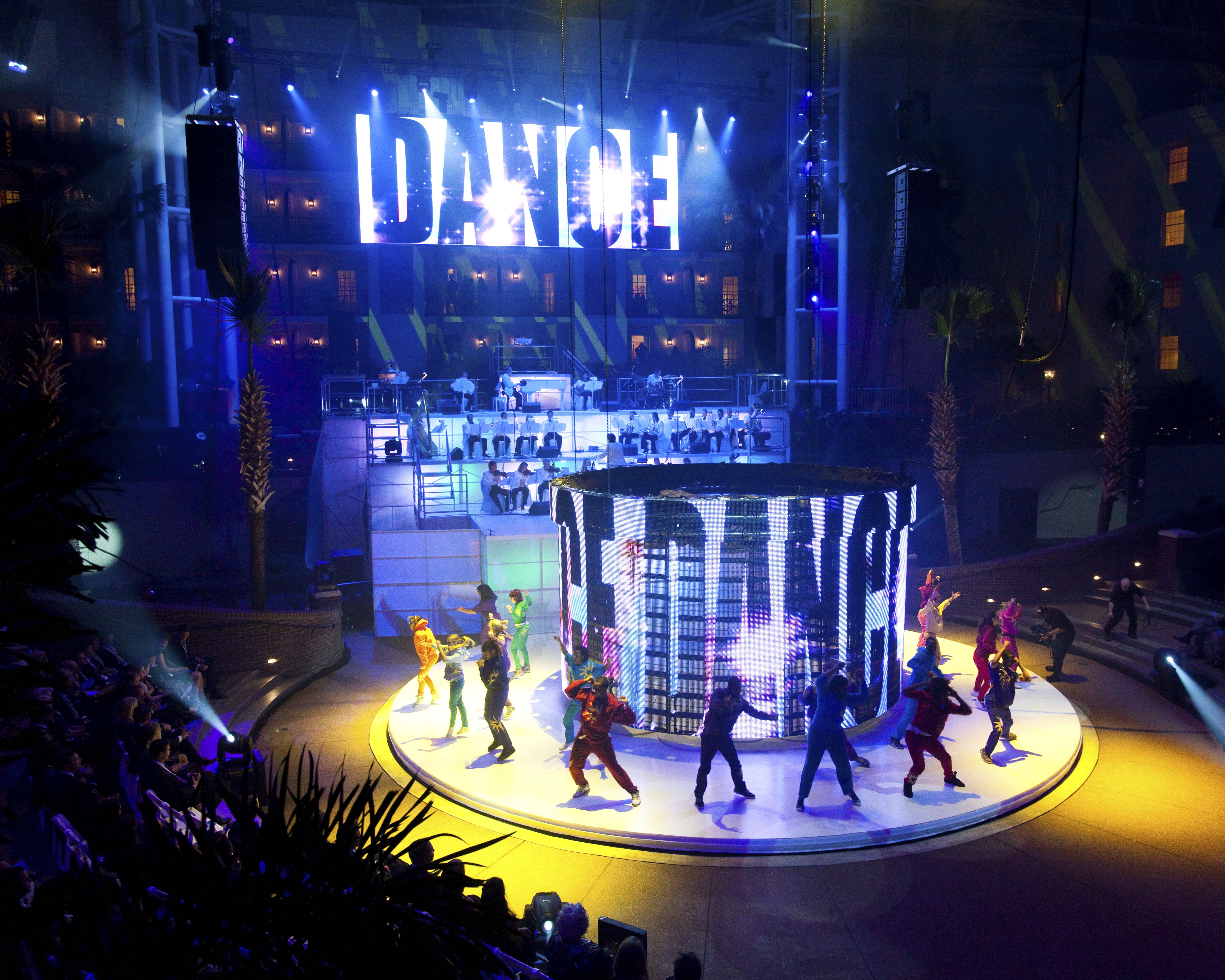 dancers on a rotunda stage with the words dance in big lettering for Gaylord Nashville