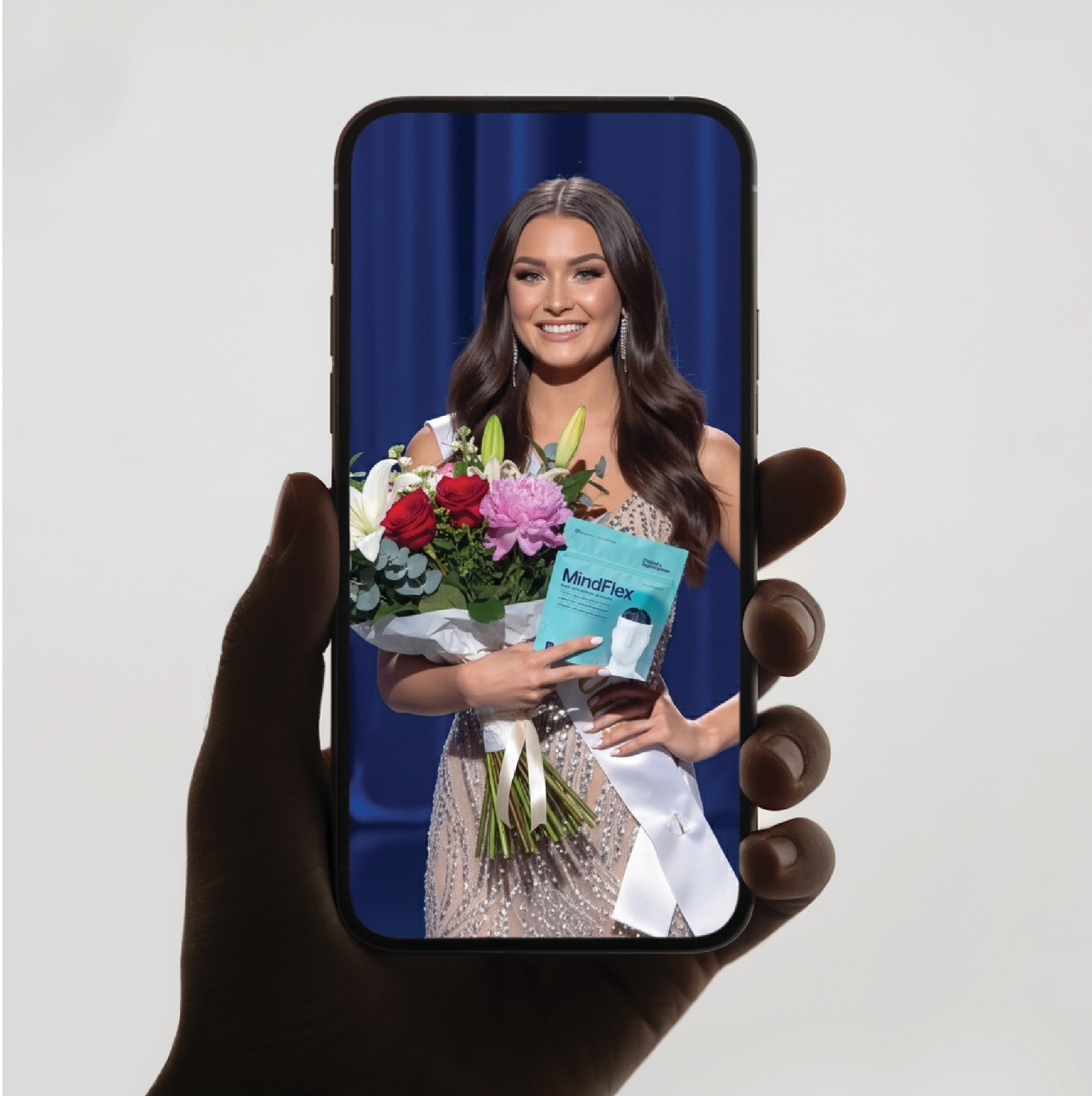 Stacked pink and red glass cosmetic jars on white—minimal skincare packaging display.