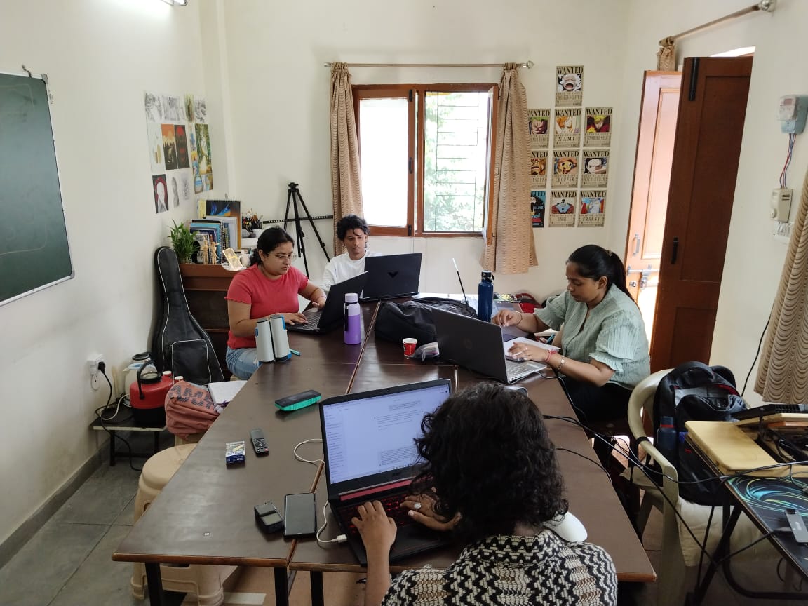people sitting on chair in front of computer