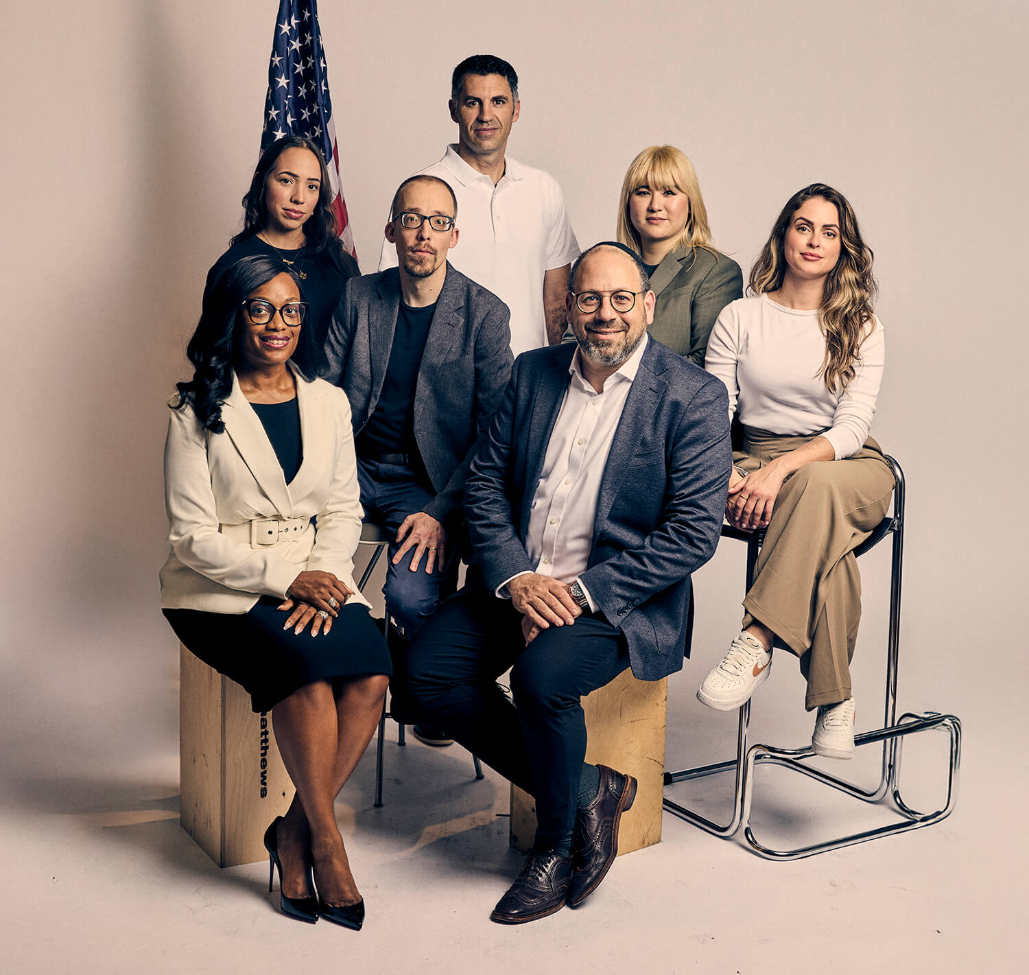 people in a room working exposed brick
