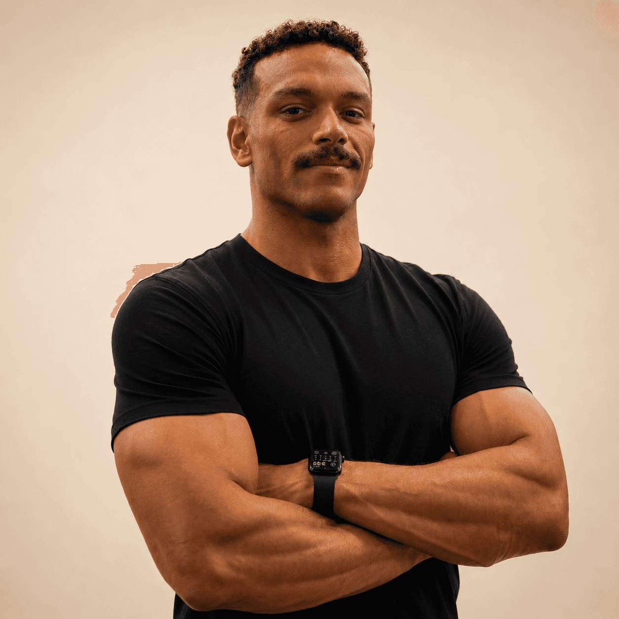 Two individuals are working out in a gym, focusing on dumbbells and strength training equipment.