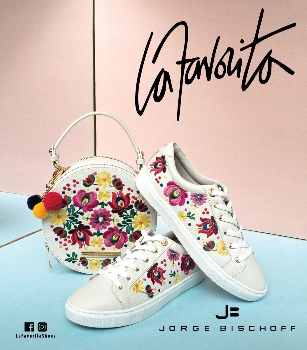 La Favorita ad showcasing a floral embroidered shoe and purse set by Brazilian designer Jorge Bischoff against a pastel background.