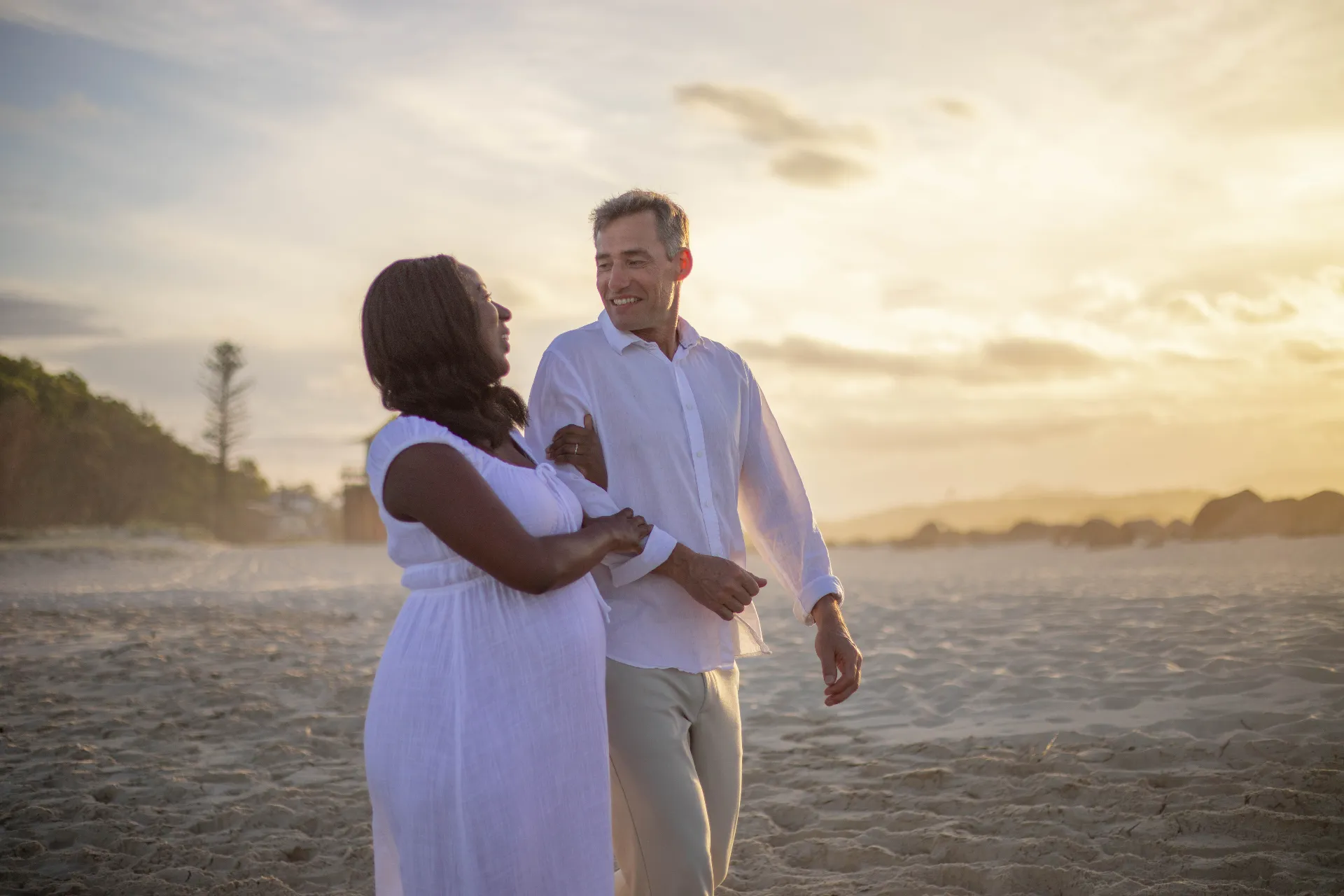 man and woman holding hands focus photo