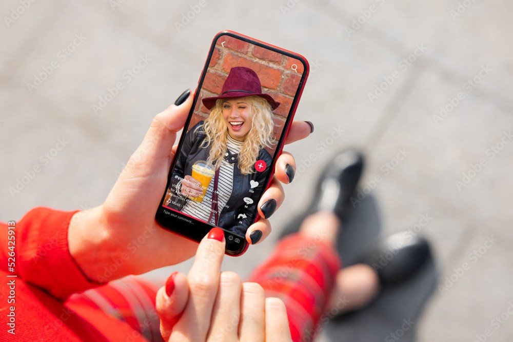 Young Woman Looking at a Person Beside Her