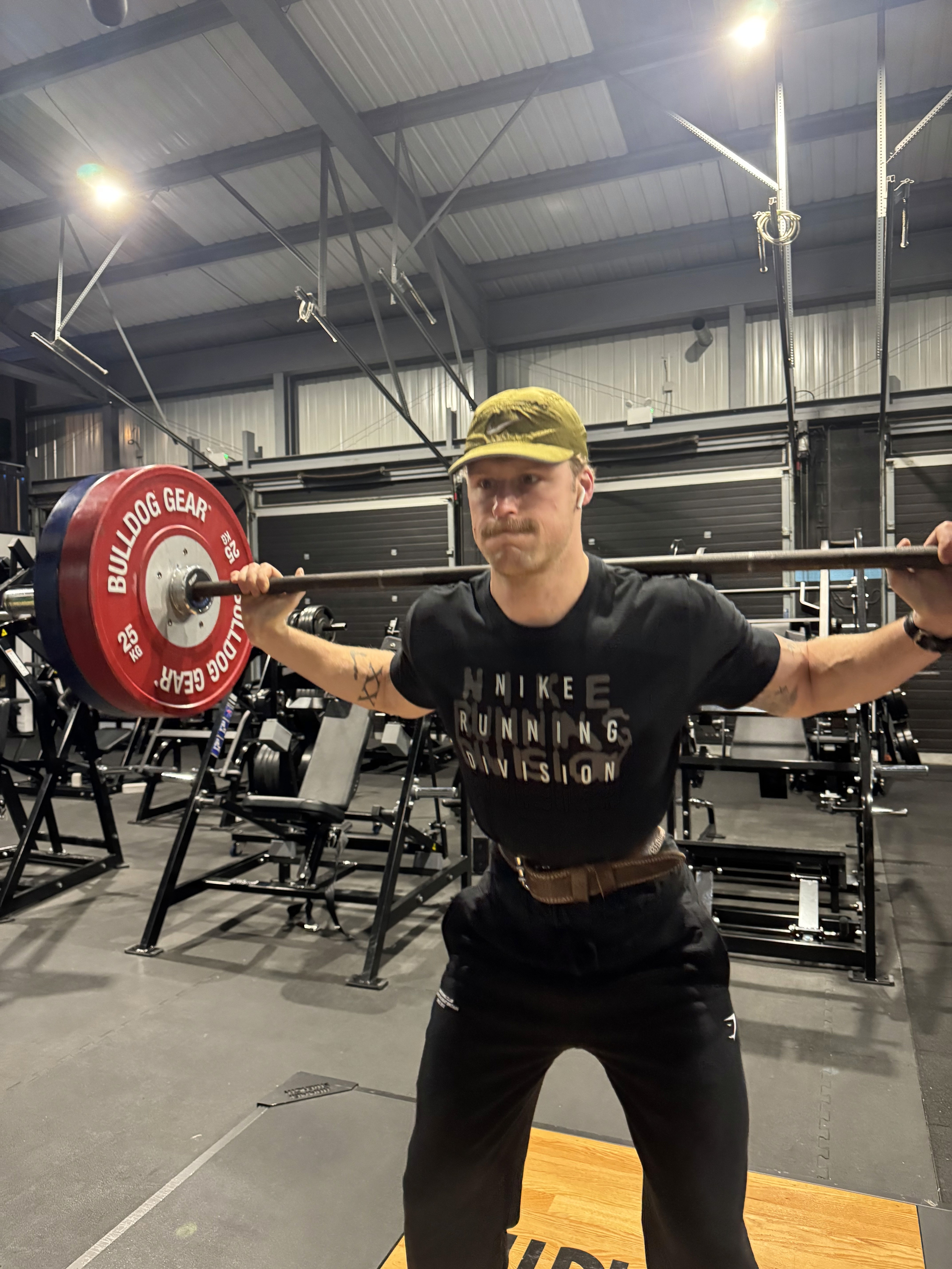 Rachel Stone standing with ABS and hands in her pockets