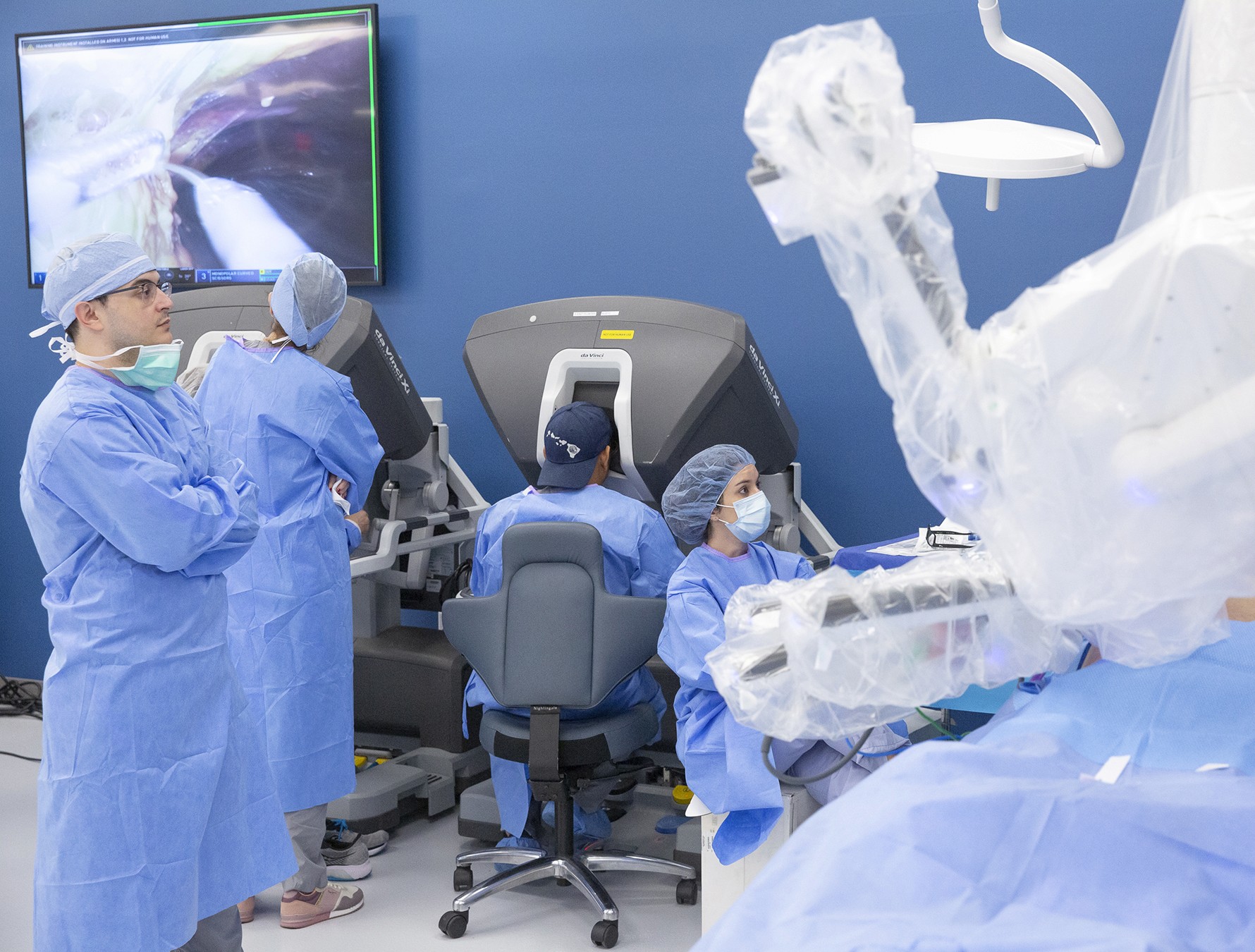 Close-up of vibrant purple flowers with droplets of water, creating a rich, textured background.