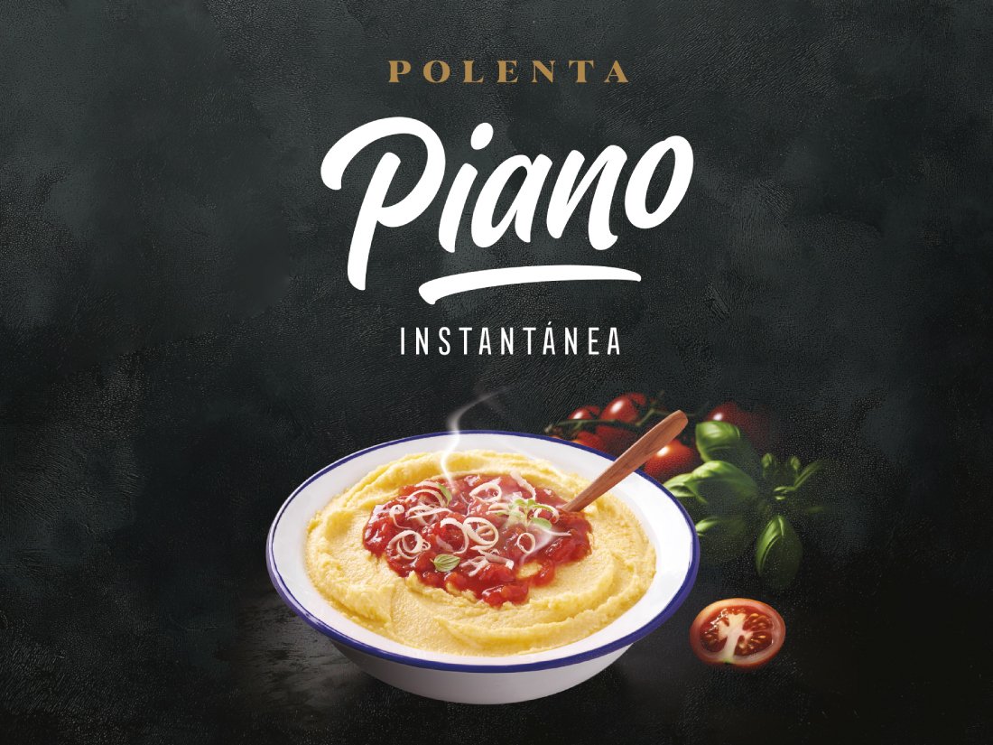 Rooftops of a coastal town with the sea in background