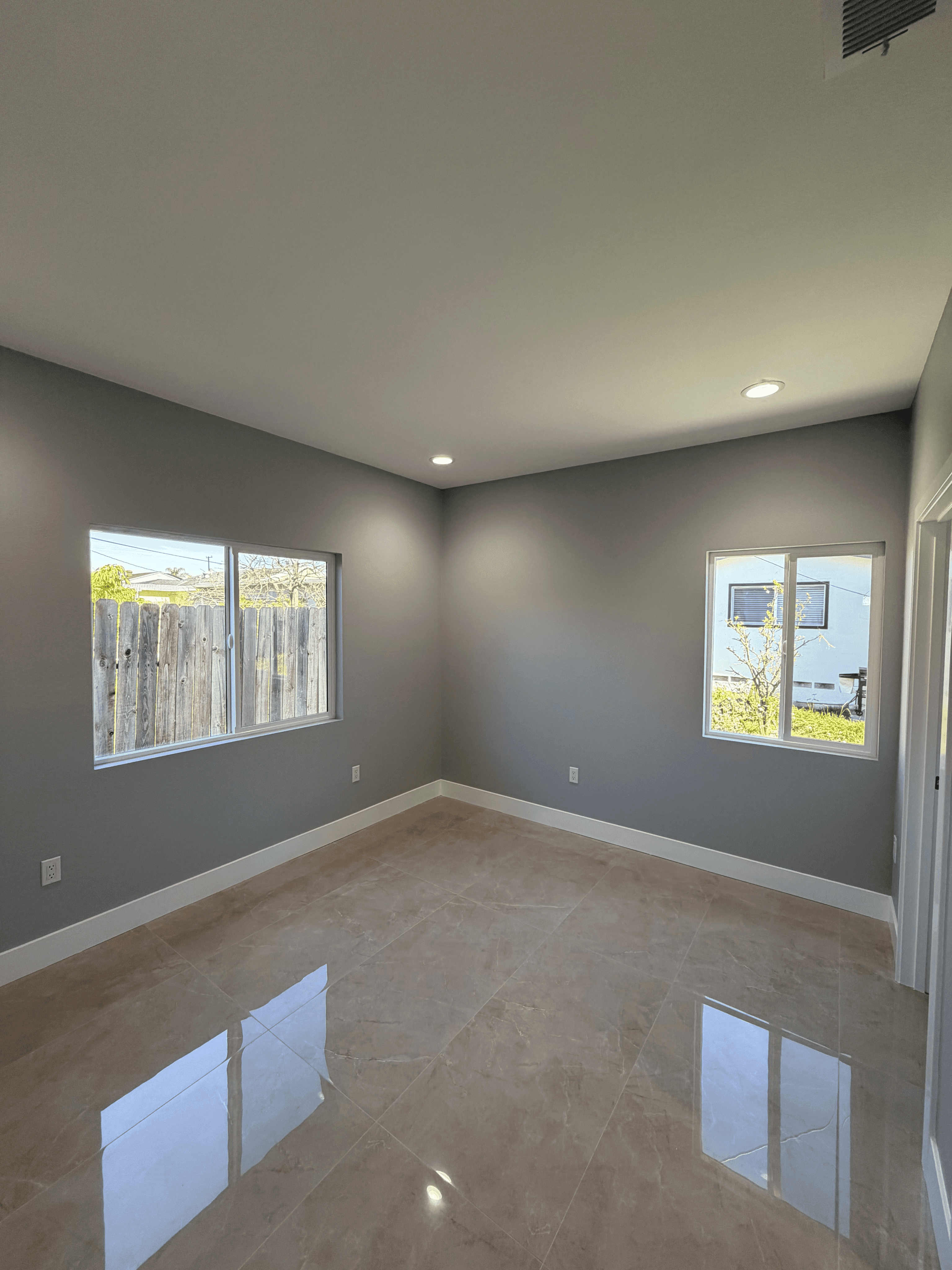 Backyard layout and landscaping around ADU – THP Construction