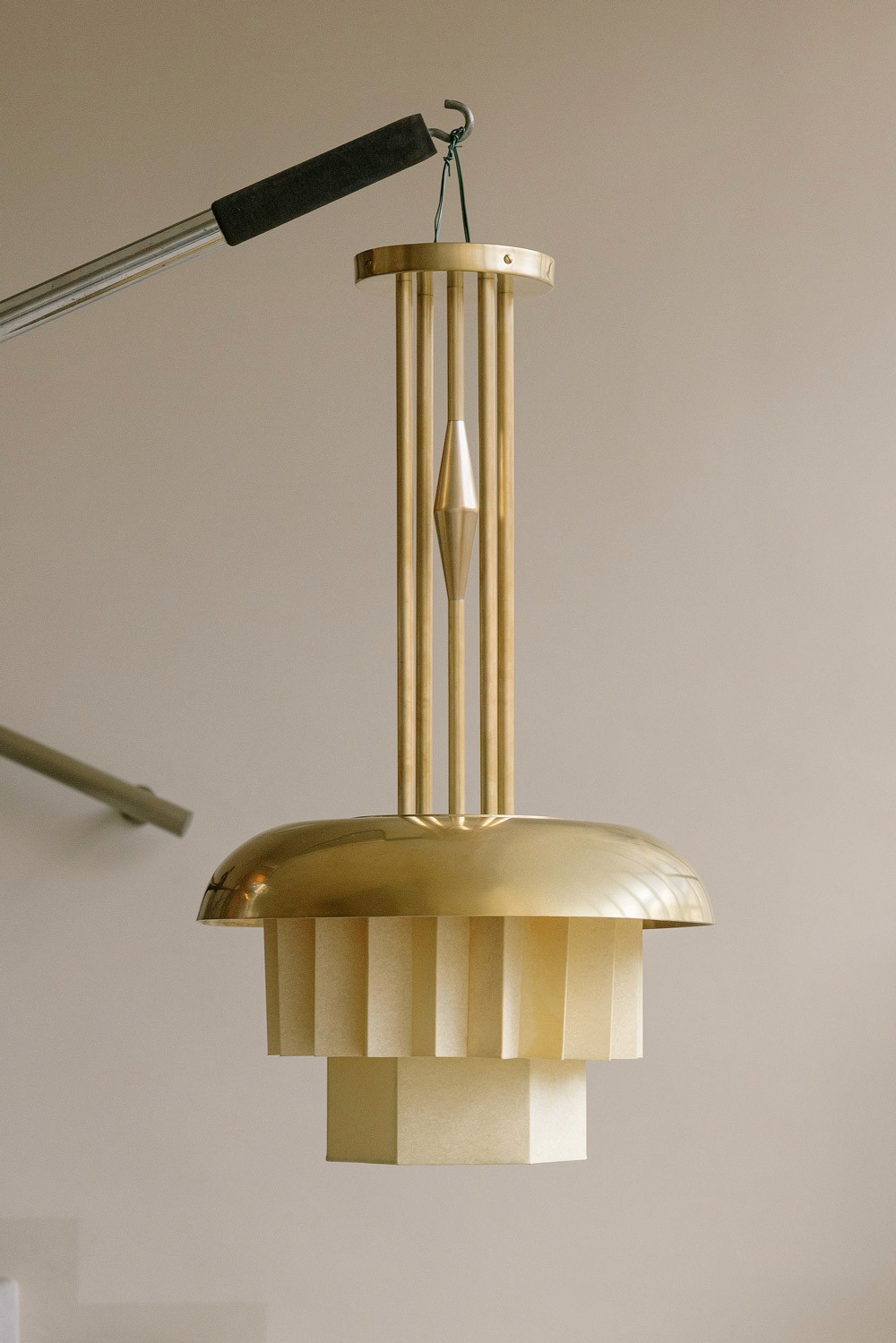 Emil chandelier shade detail showing layered paper construction and angular geometry by Jiri Krejcirik