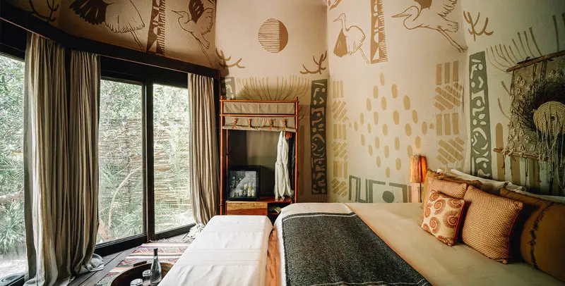 Experience a restorative and spiritual stay in the Moon Temple Room at Nomade Holbox in Holbox Mexico, featuring a private meditation area and eco-friendly amenities