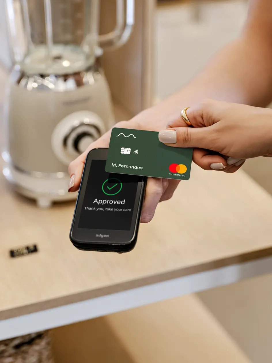 A bar tab being settled with a contactless payment