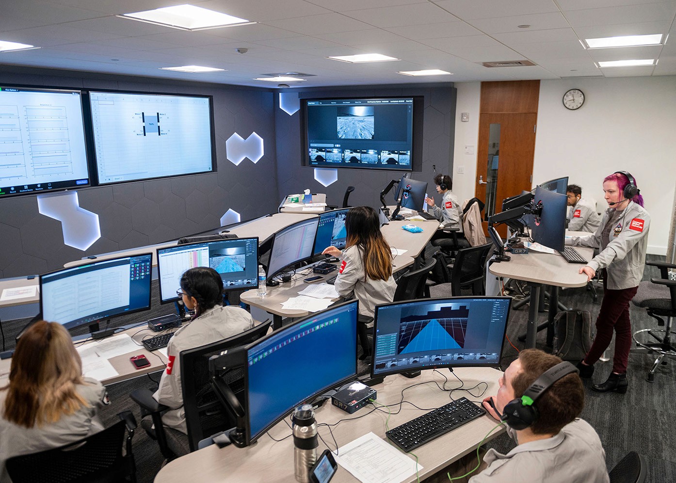 Carnegie mellon students in a control room