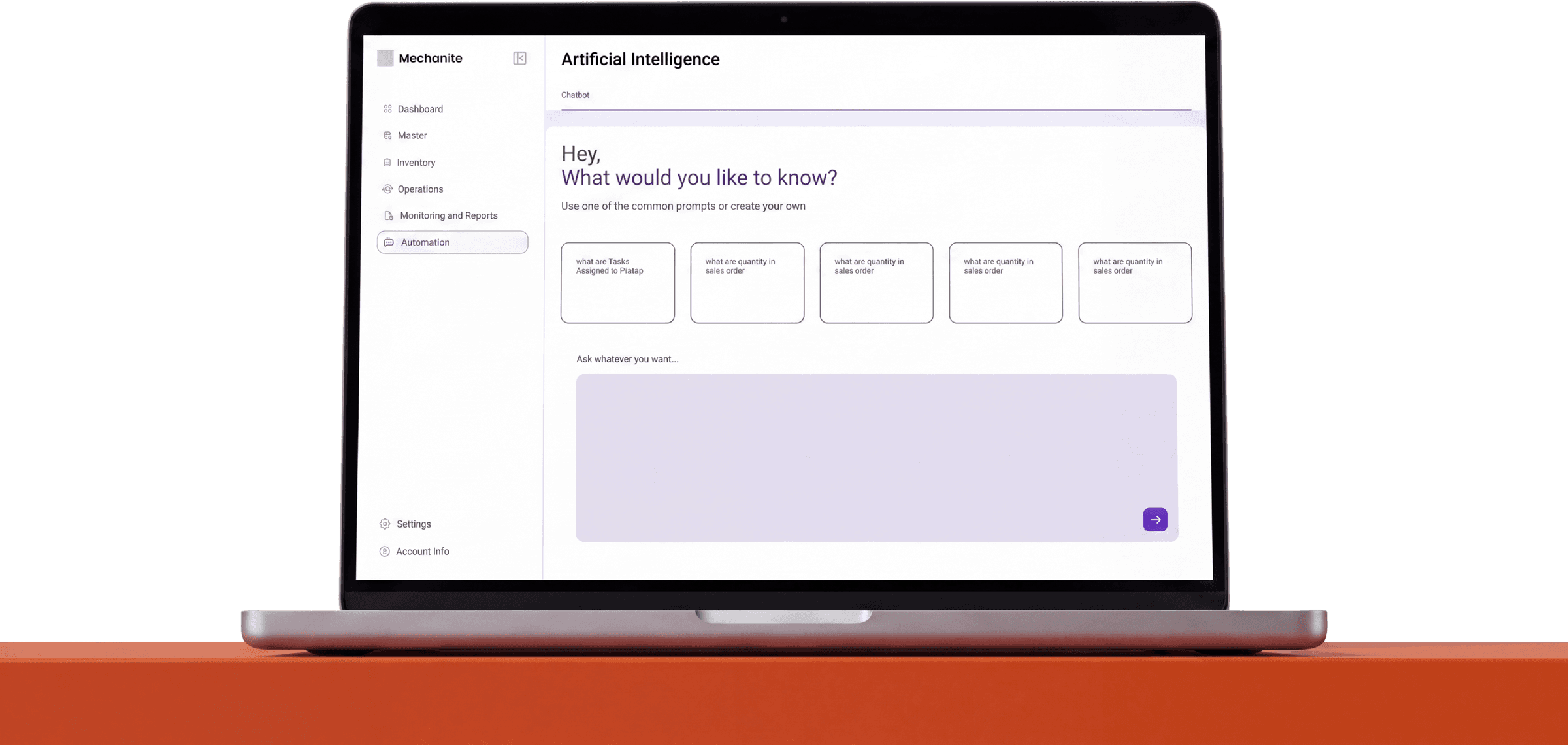 The manufacturing platform's AI chatbot open on a laptop