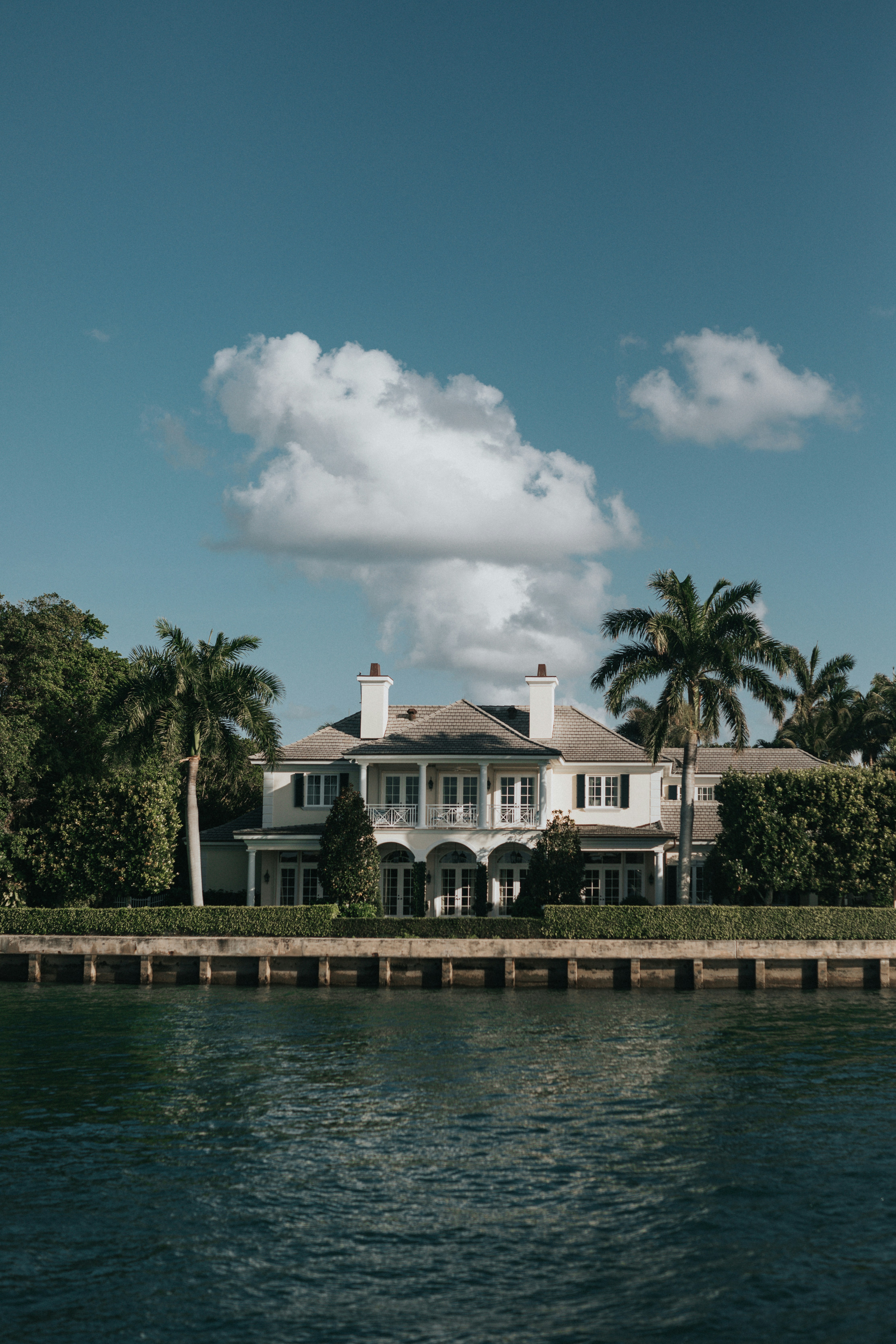 flat lay shot of spa amenities by the bathtub