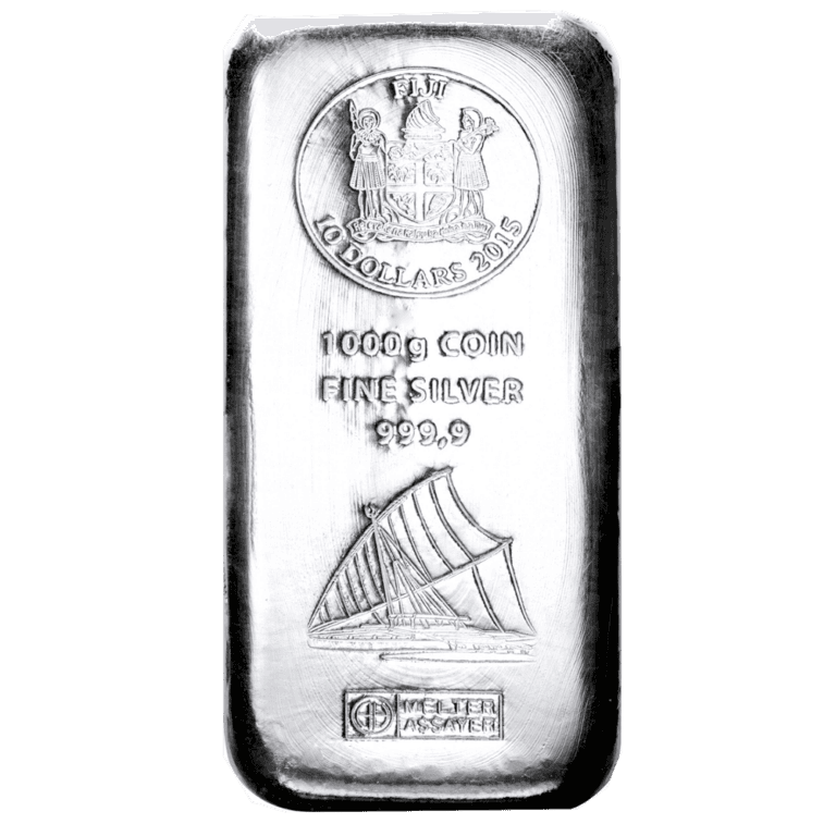 Smiling young man with short hair poses against a dark background, wearing a green button-up shirt.