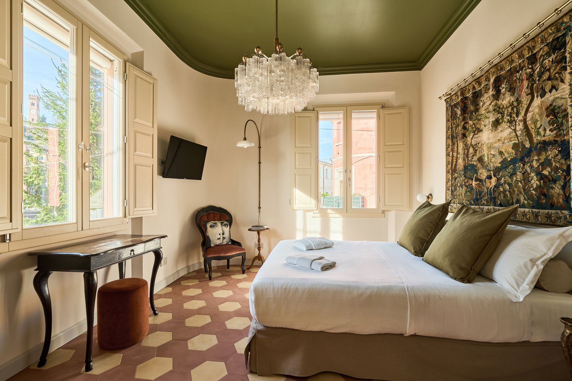 A close-up of a serene face illuminated by soft light, with shadows creating a patterned effect across the skin.