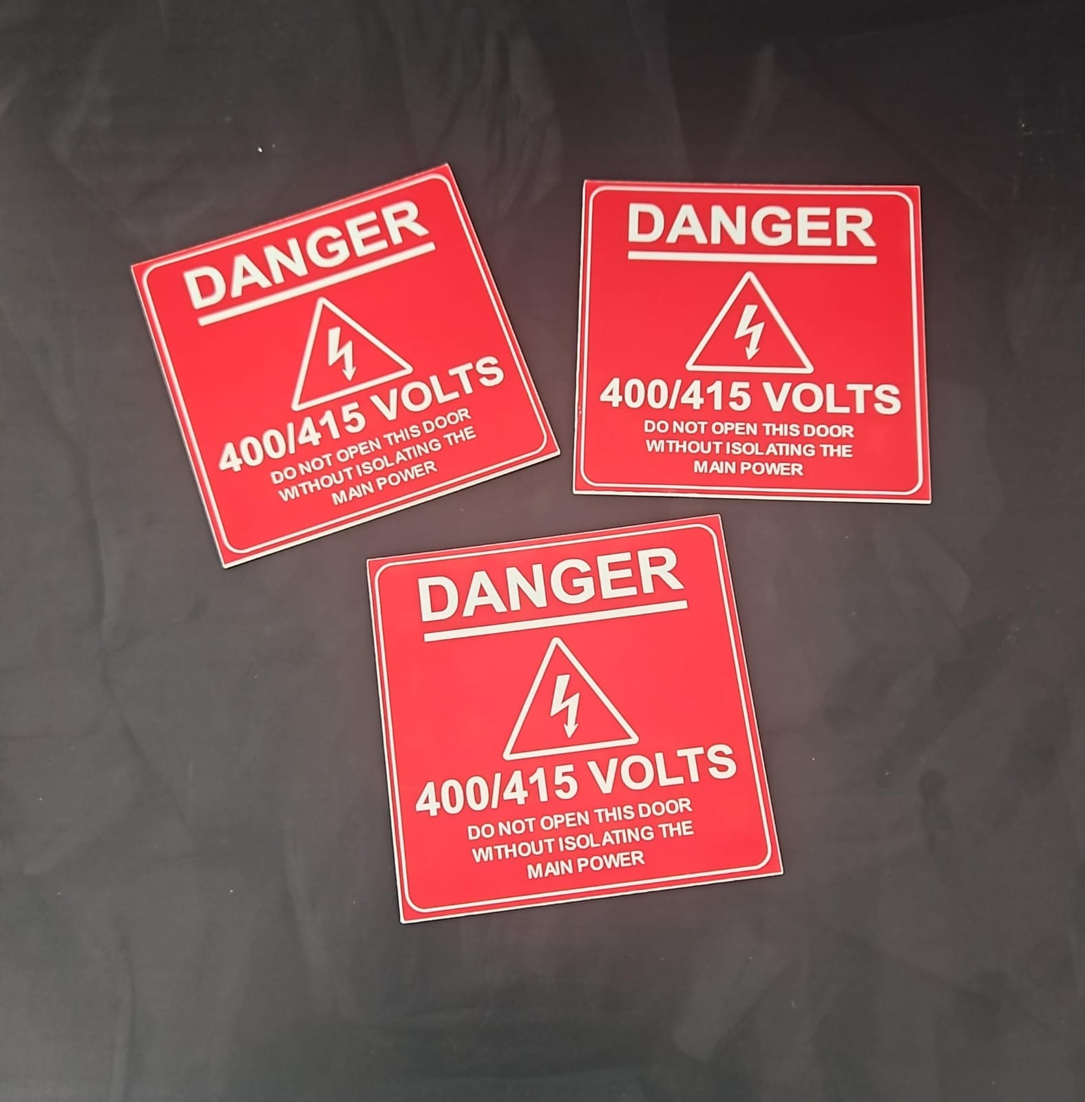 1.5mm-red-white-pvc-engraved-labels-and-tags-in-uae-black-ink-graphics