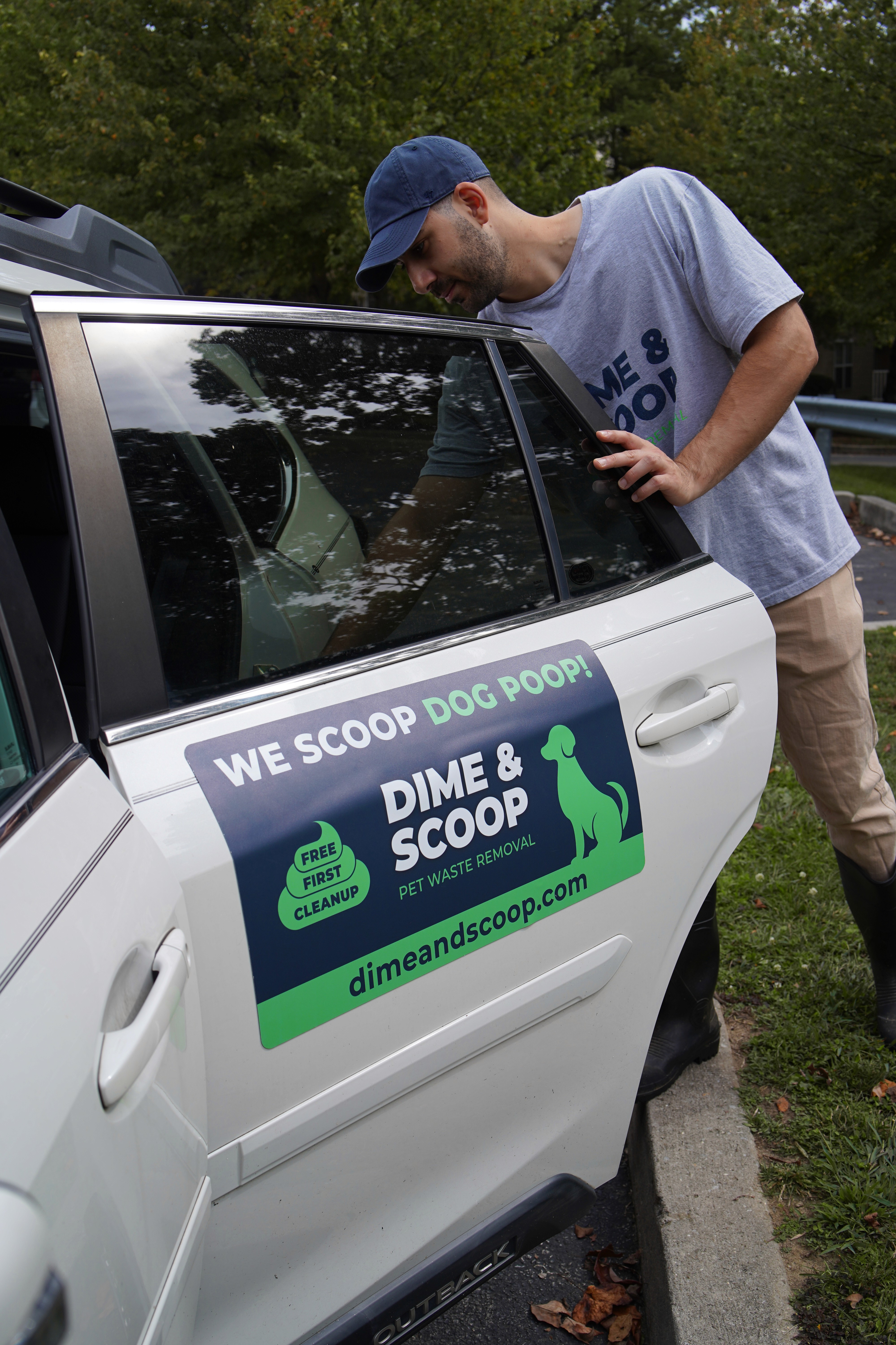 family smiling sitting outside together