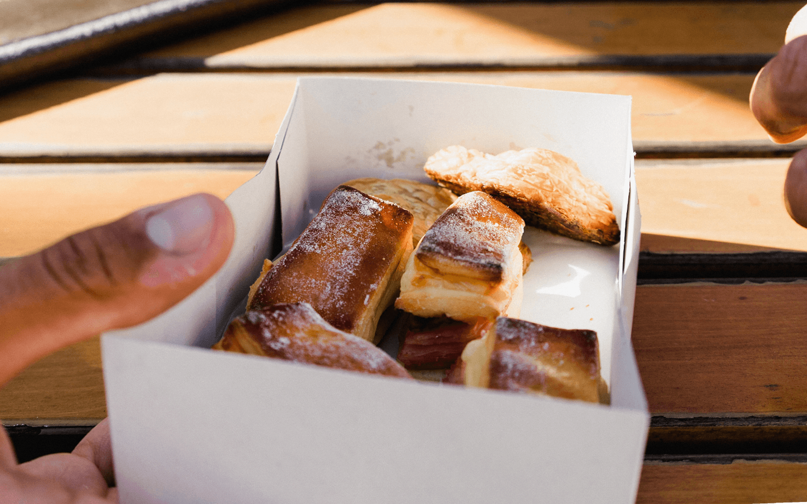 Portuguese pastries in a box during the Original Porto Petiscos Crawl.