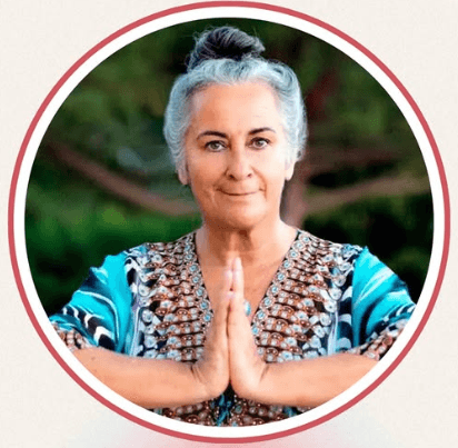 Woman participating in a virtual training session on a laptop