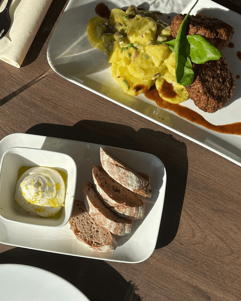 a vanilla ice cream with matcha cream served in a white plate