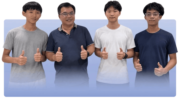 Mr Isaiah Low with his students
