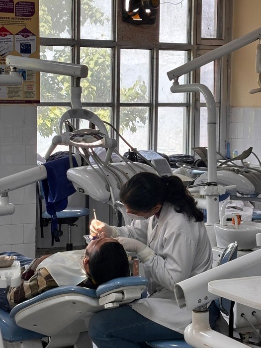A dentist treating a patient in a modern dental clinic