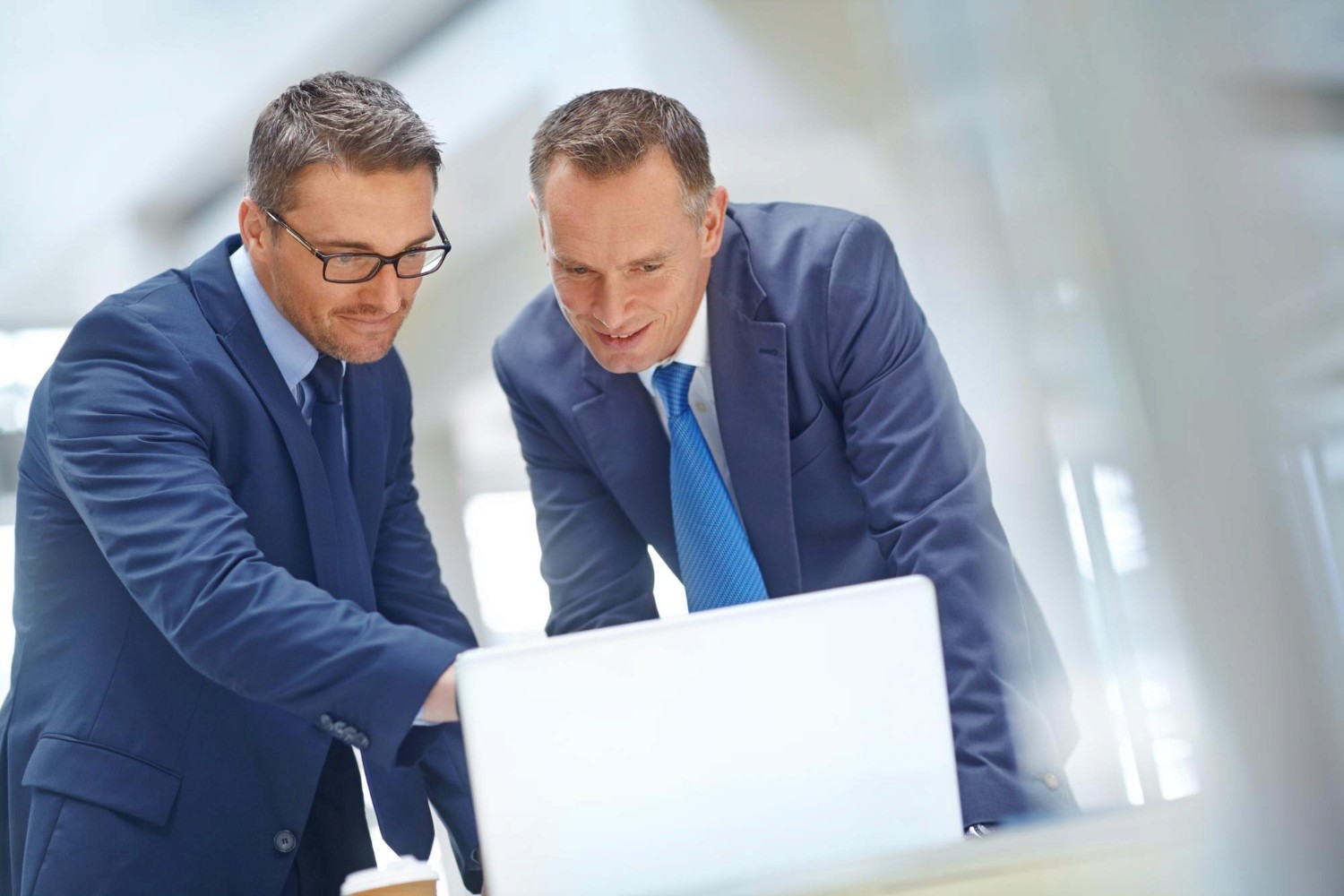 brisbane finance brokers doing loan search and application on laptop