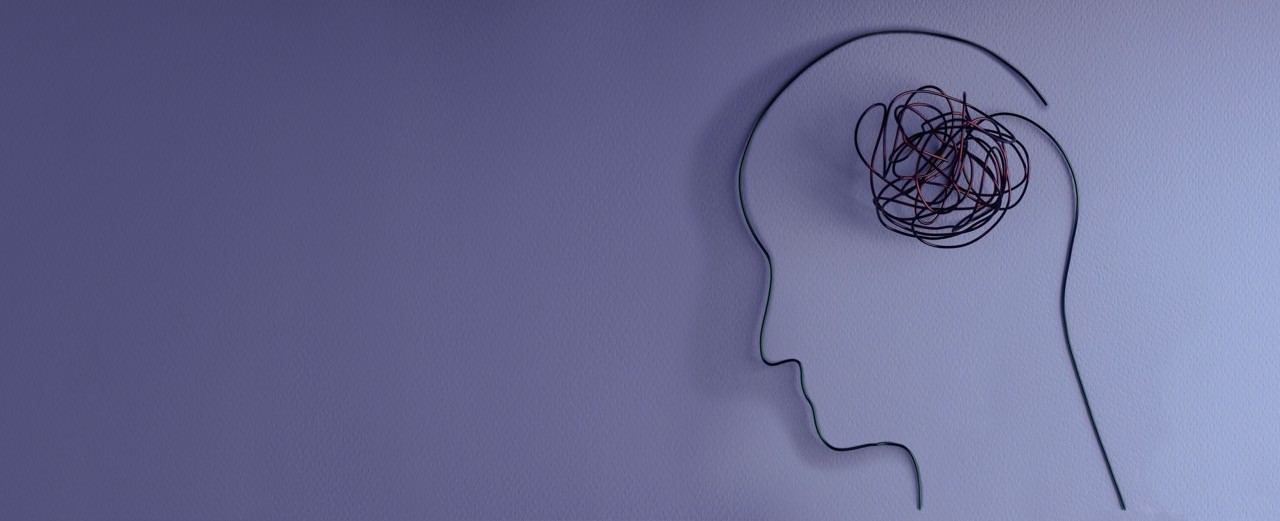Figure of head with jumbled thoughts