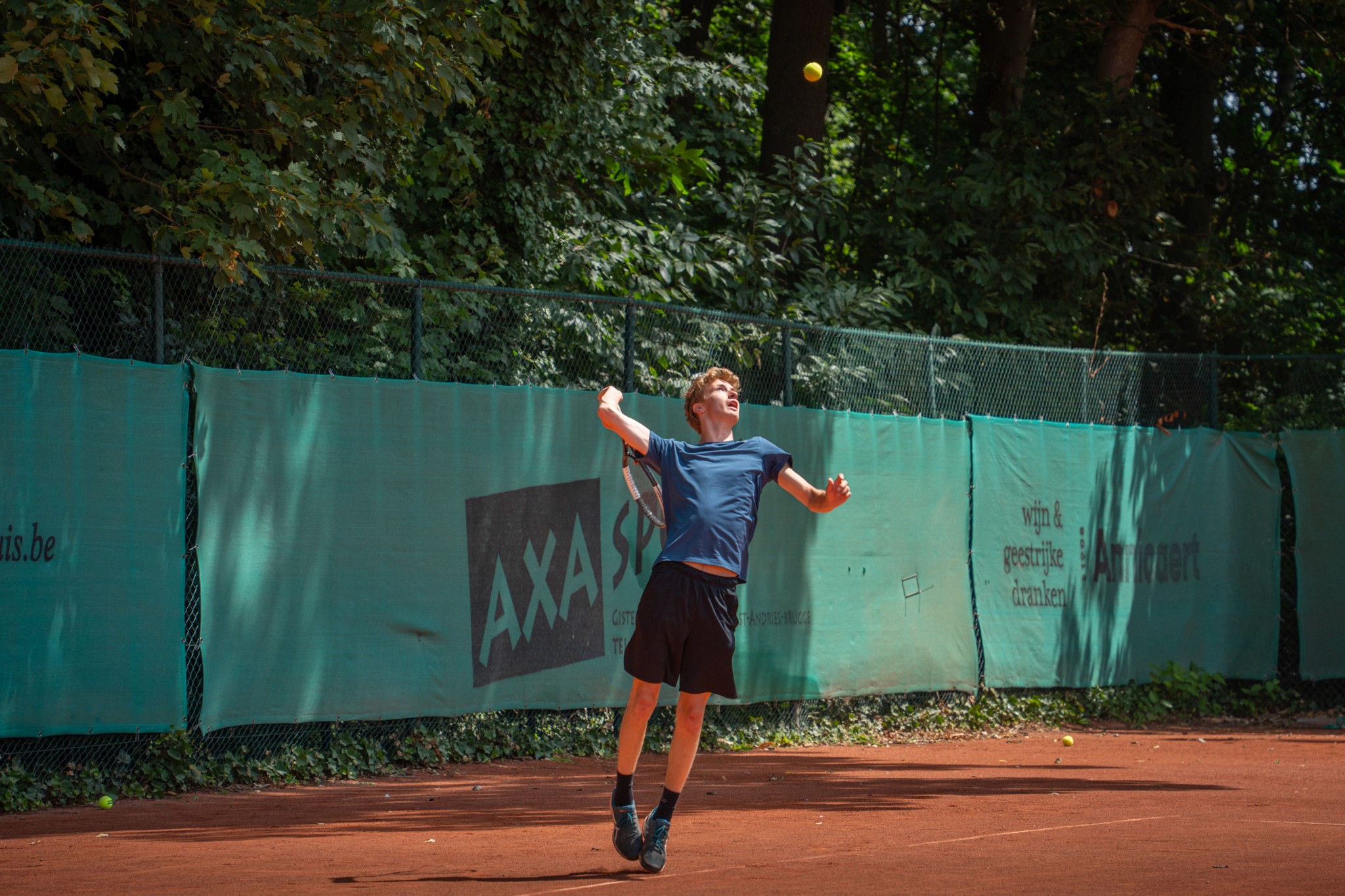 White logo on purple background