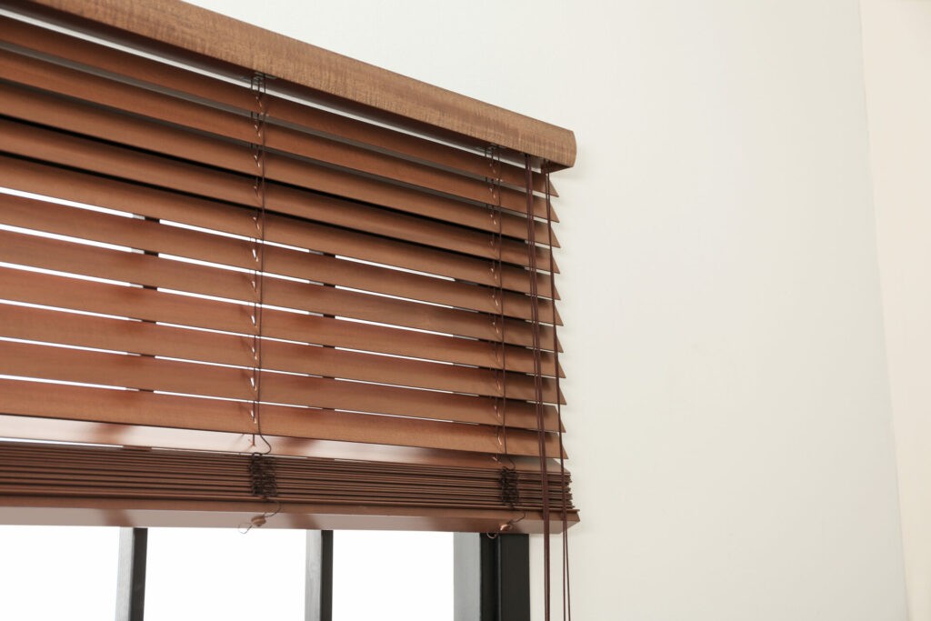 Faux wood blinds on a window