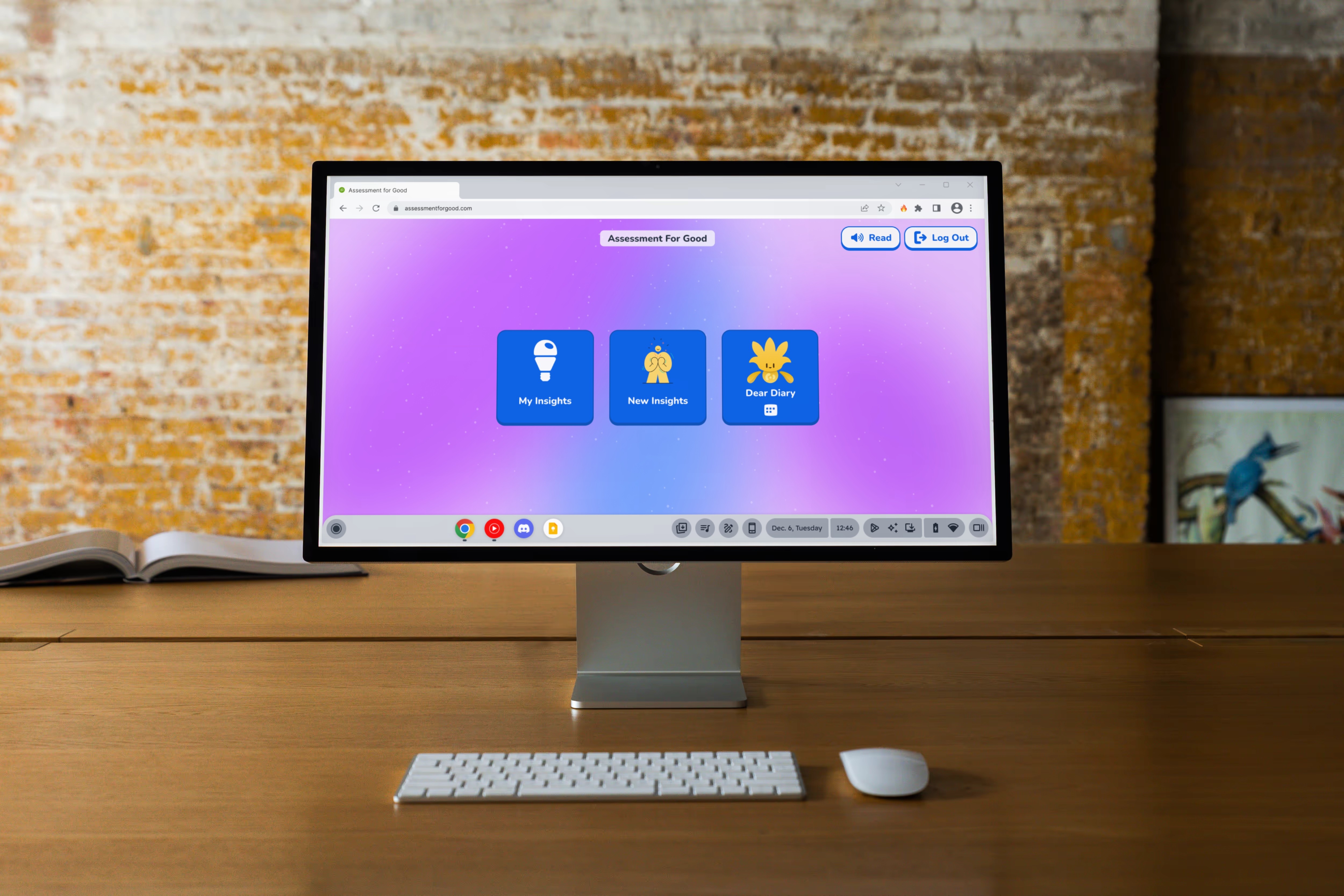A mockup for an iMac placed on a table for a website