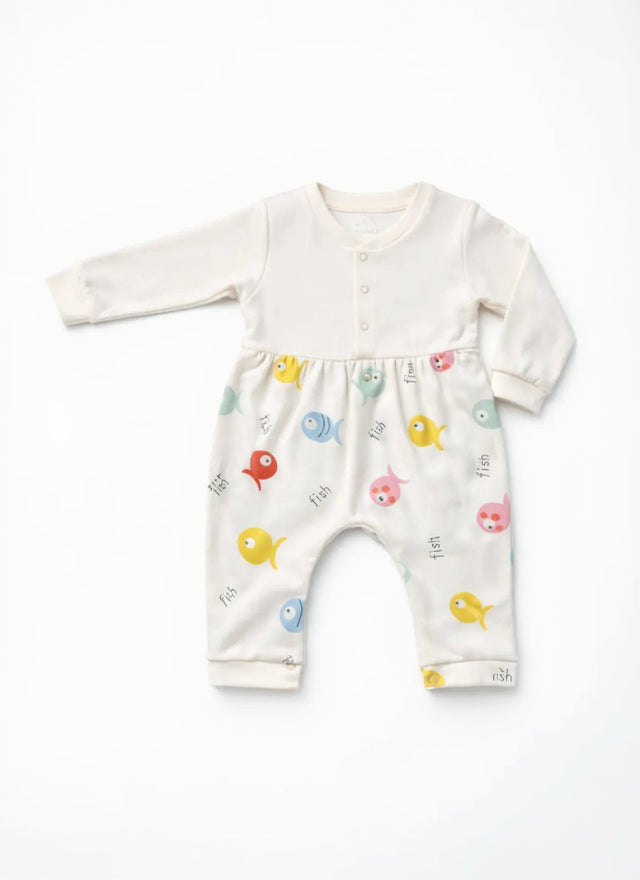 Baby onesie with colorful fish pattern on a white background