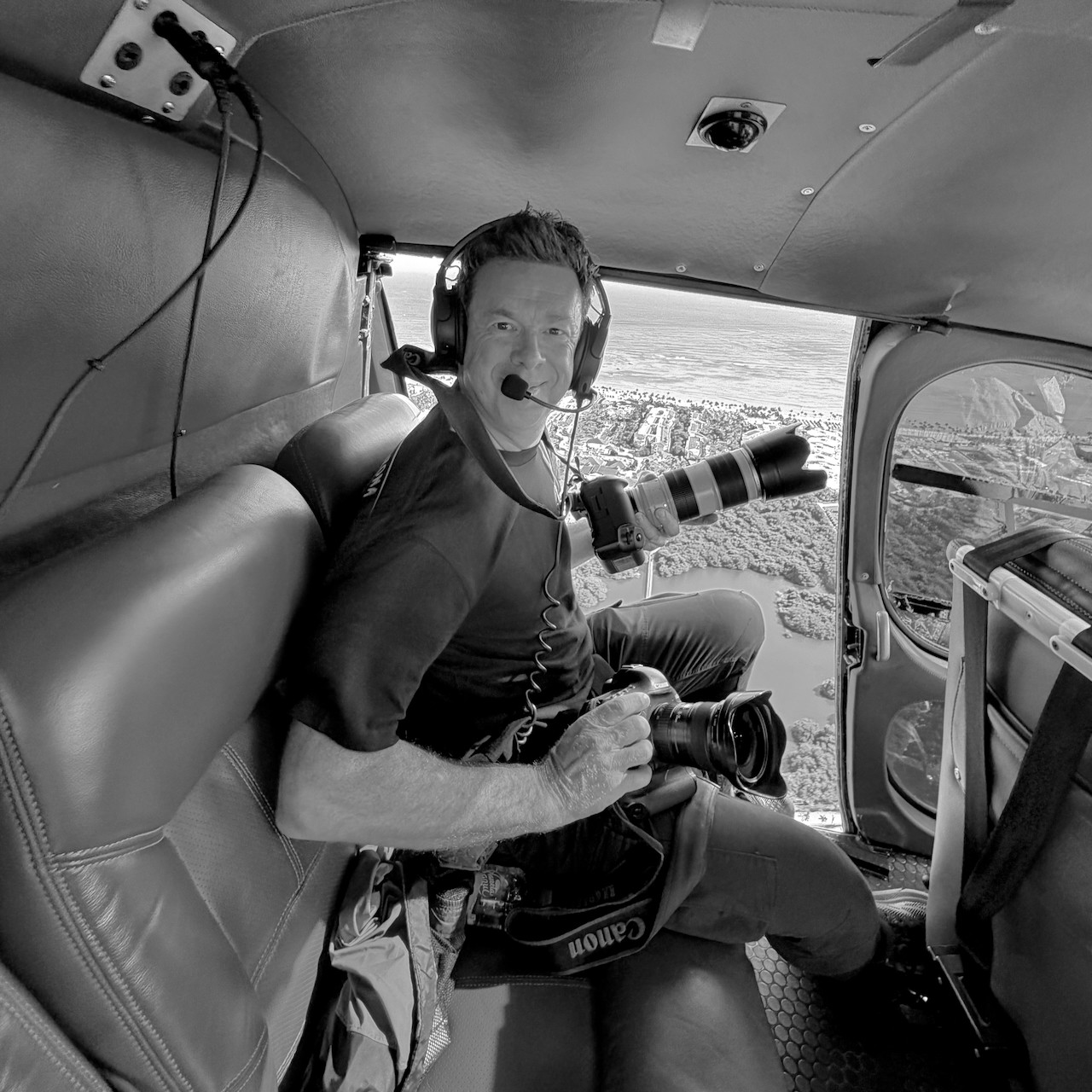 grayscale photo of bike on wall