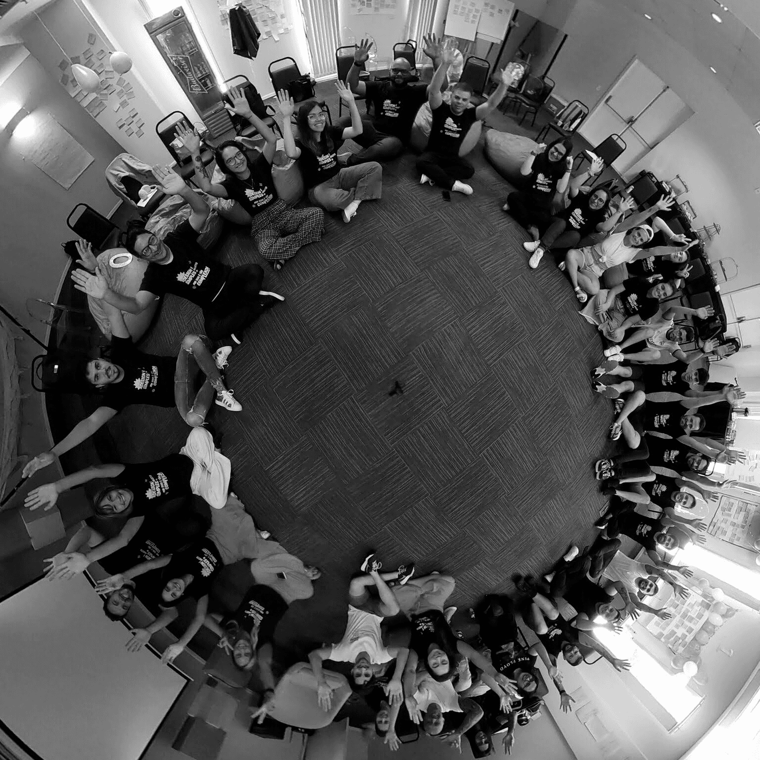 man filming on beach
