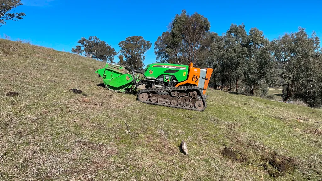 Cutting overgrown grass on challenging terrains