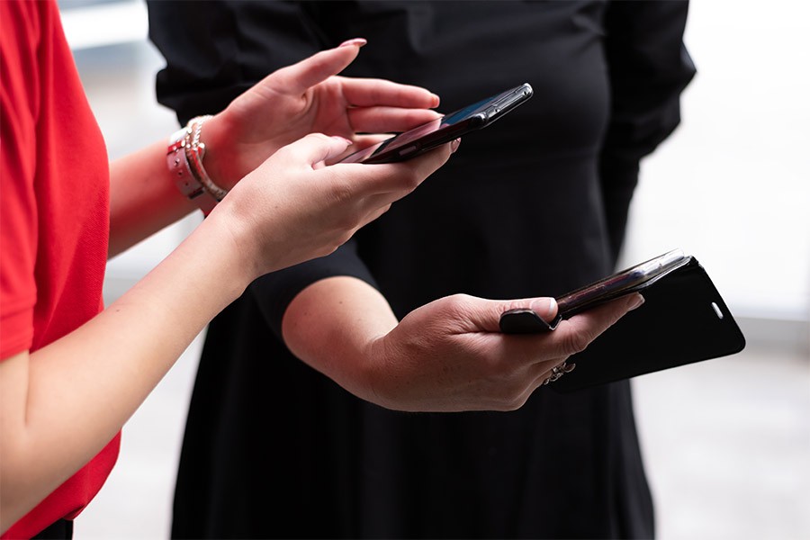 Venue worker scanning mobile ticket.