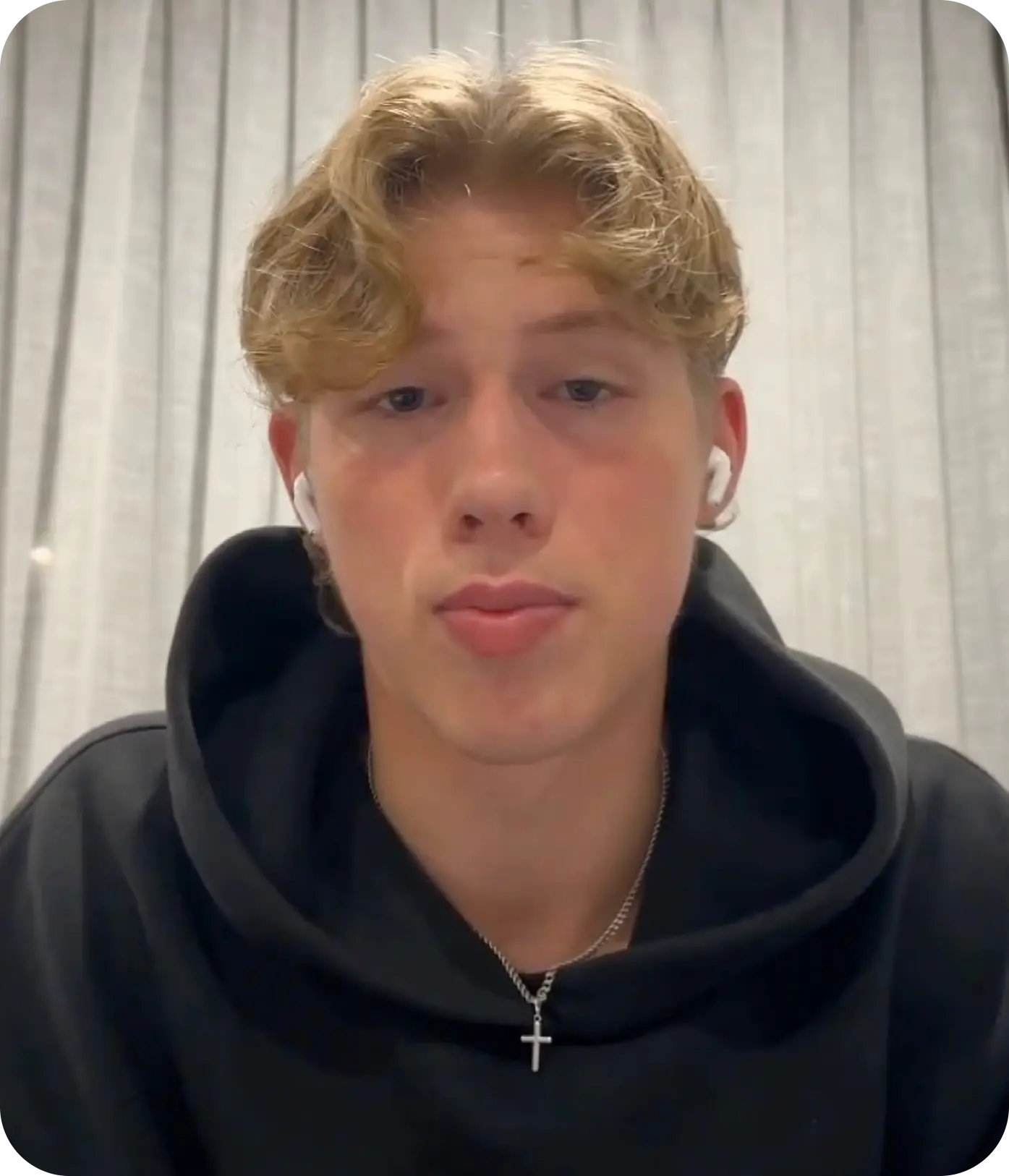 man standing beside wall