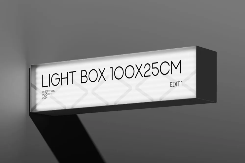 Wall-mounted lightbox mockup with a sleek black frame, illuminated against a neutral gray background. The light creates a bold shadow, emphasizing the clean, modern design.