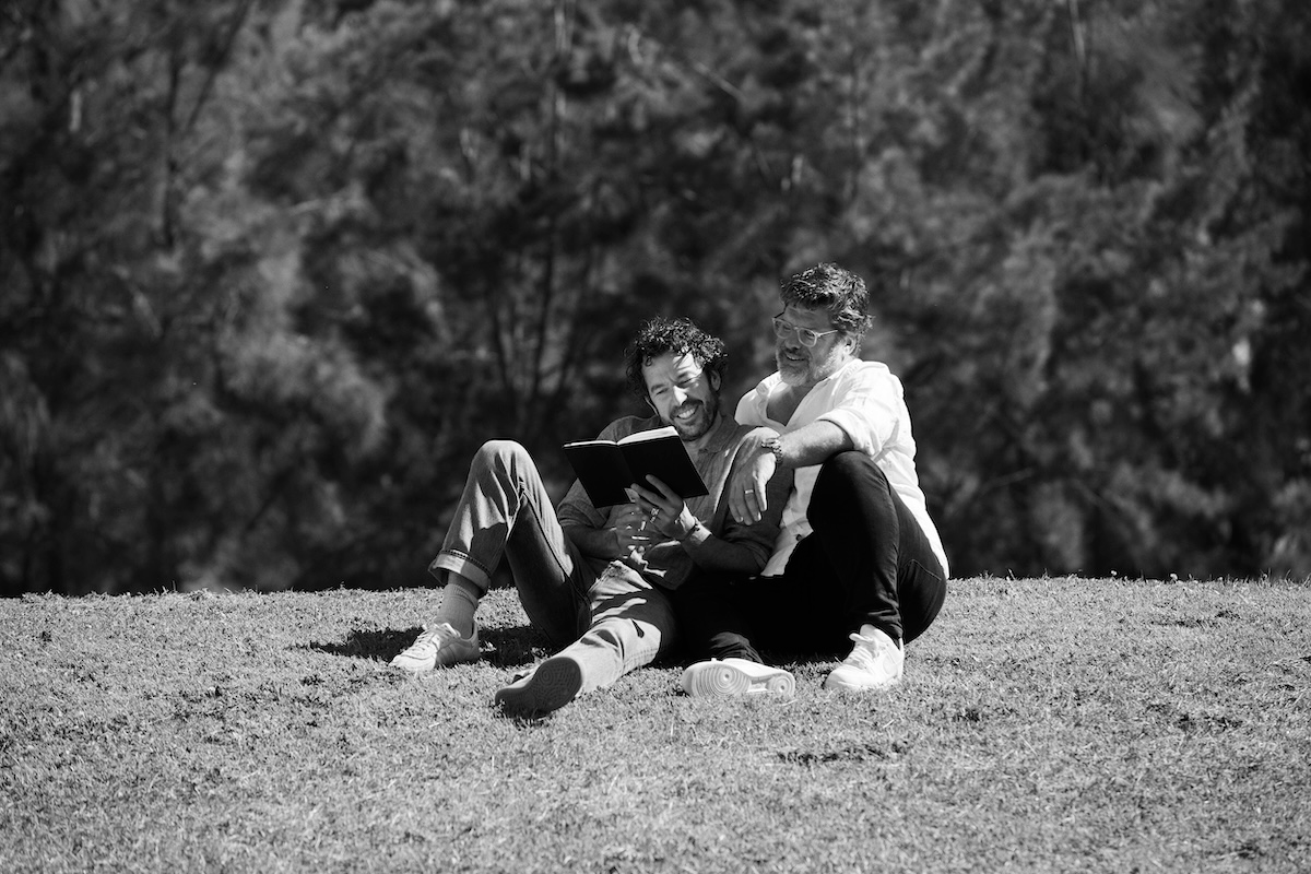 a close up of a black and brown abstract painting
