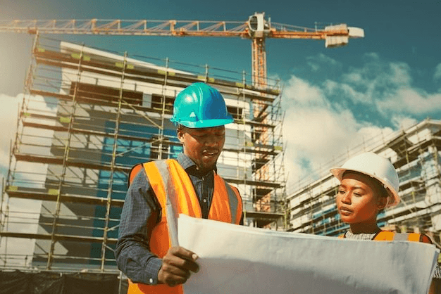 Construction team reviewing a building plan.